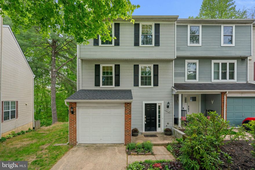 Welcome to 10314 College Square, a beautifully updated end-of-group townhome backing to woods in the heart of Columbia — offering rare privacy, walkability, and lifestyle in one exceptional package.

Tucked against a wooded backdrop, this home enjoys peaceful views and added privacy while still being just steps from Merriweather Post Pavilion and the vibrant Merriweather District. Concerts, dining, festivals, trails, and lakes are all part of everyday life here.

Inside, you’ll find over 2,050 finished square feet, 3 bedrooms, 2.5 baths, a finished lower level, and a 1-car garage. The updated kitchen (2022) features white cabinetry, stainless steel appliances, subway tile backsplash, pantry storage, breakfast room, and a new slider leading to a brand-new deck (2025) overlooking the woods and perfect for indoor-outdoor living. The main level also includes hardwood floors and a cozy wood-burning fireplace.

Upstairs, the spacious primary suite offers great closet space and an updated en-suite bath with a new shower insert. All bathrooms throughout the home have been updated, creating a truly move-in-ready experience. Two additional generously sized bedrooms and a renovated hall bath complete the upper level.

Major improvements provide peace of mind: New roof (2024), HVAC & hot water heater (2022), poly piping replaced (2025), New windows (2022), New carpet (2025), New deck (2025), and a new sliding door (2025). Freshly painted (2026)! Fully fenced yard! 

The Columbia Association annual assessment fee grants access to Columbia’s extensive network of walking and biking trails, lakes, pools, fitness centers, and recreational amenities at a significantly discounted resident rate.

Located in the Village of Hickory Ridge, backing to woods and close to everything Columbia has to offer, this is a rare opportunity to enjoy privacy without sacrificing location.