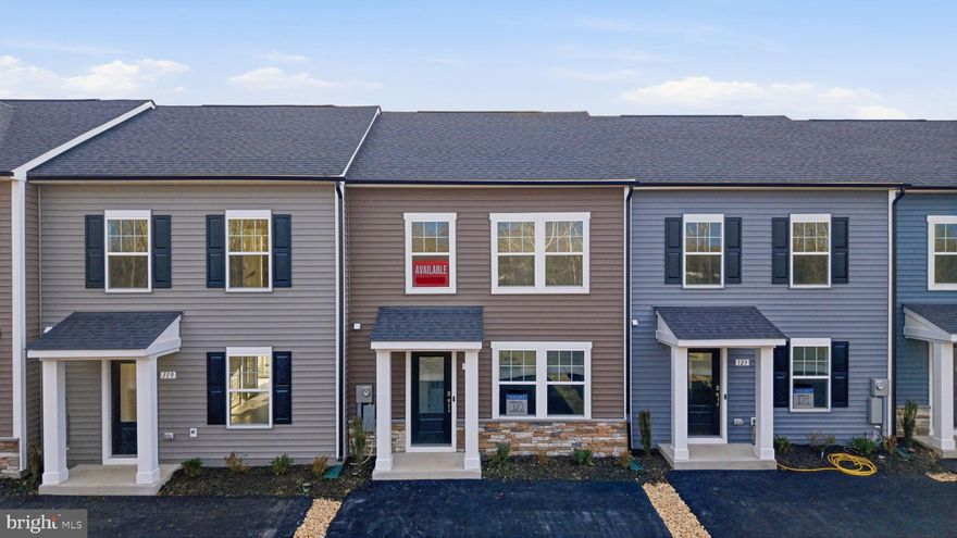 *OFFERING UP TO $18K IN CLOSING  COST ASSISTANCE FOR PRIMARY RESIDENCE WITH USE OF APPROVED LENDER AND TITLE.*
MOVE-IN READY! Step into this inviting 2-level townhome featuring 3 bedrooms, 2.5 bathrooms, and a spacious, thoughtfully designed layout. The main level offers an open-concept living area filled with natural light, a modern kitchen with gray cabinets, quartz countertops, stainless steel appliances, and a large center island, plus a cozy dining area that opens directly to the backyard. A convenient half bath and additional storage space complete the first floor. Upstairs, you’ll find all three bedrooms, including a generous primary suite with a walk-in closet and private ensuite bathroom. Two additional bedrooms share a full bath and offer plenty of space for family, guests, or a home office. Outside, enjoy a covered front entry and the bonus of an oversized paved driveway that fits up to 4 vehicles.