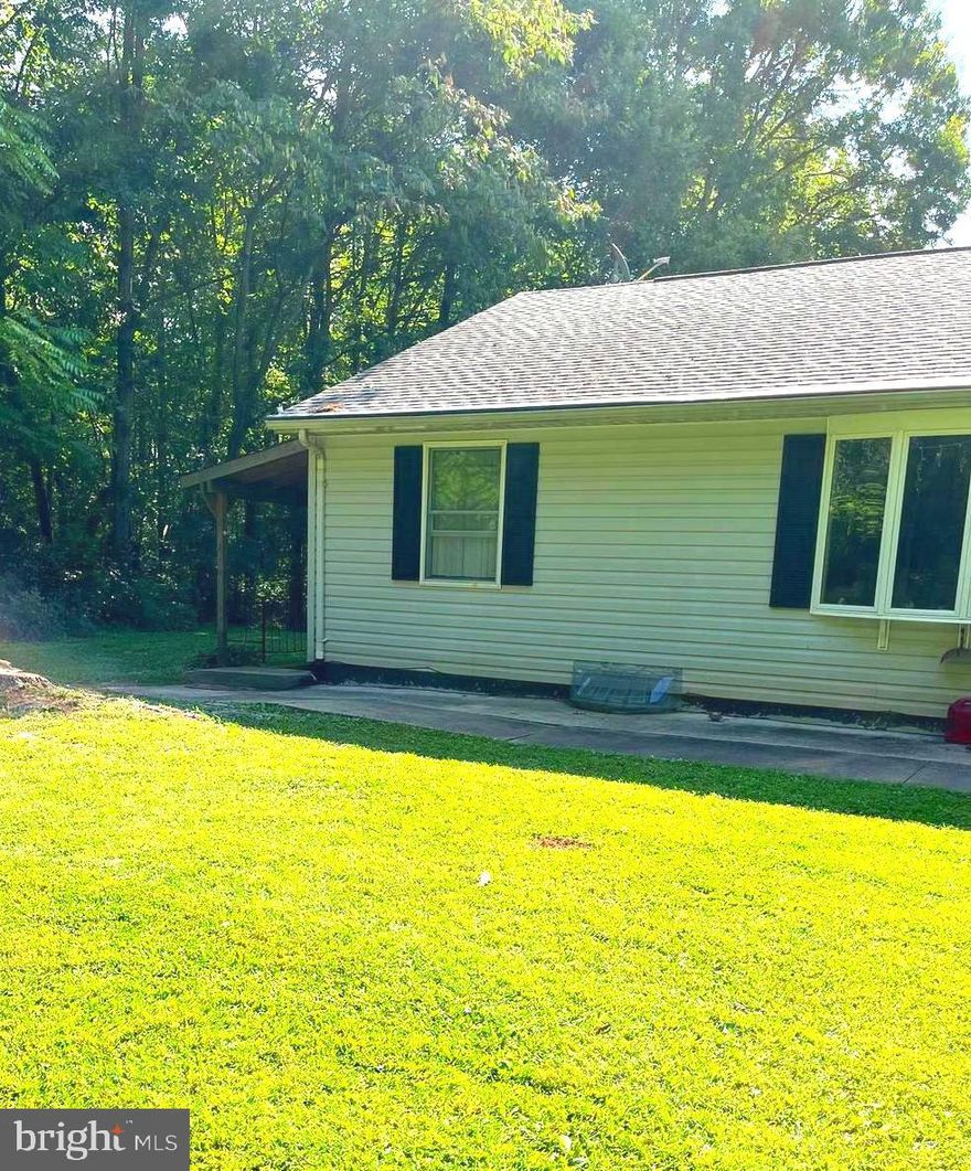 Basement Apartment (roughly 1,000 sqft) featureing a large living room; spacious eat-in kitchen; 2 bedrooms and one flex room that could be an office/den.