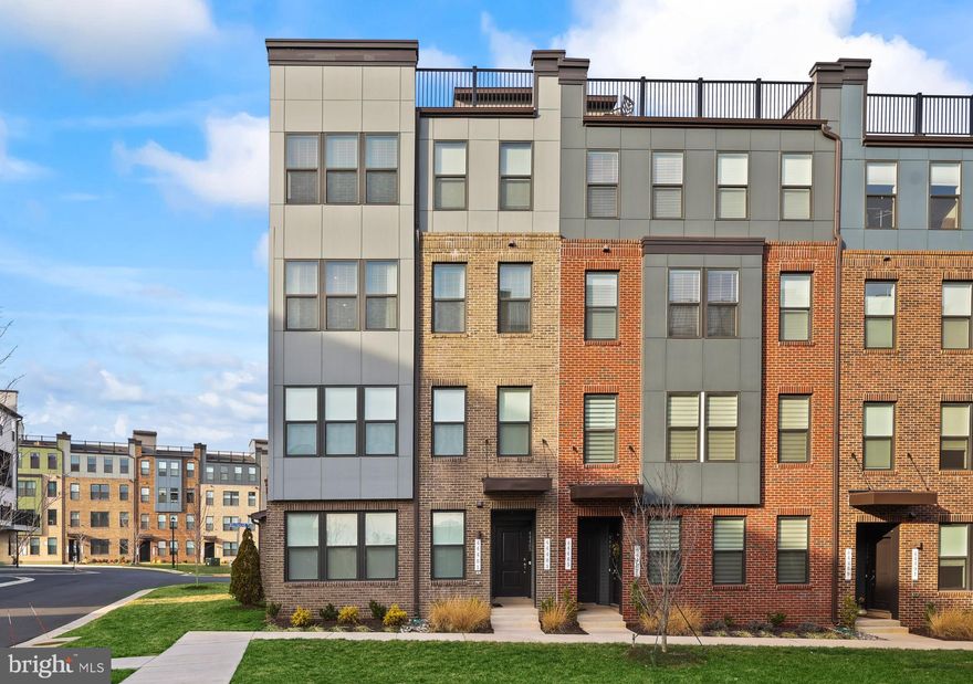 Welcome to 44483 Wolfhound Square, a stunning end-unit, townhome-style condo offering 3 bedrooms, 2.5 bathrooms, and over 2,500 square feet of thoughtfully designed living space. Built in 2022, this home feels brand new and showcases an open, modern floor plan filled with natural light. The main level features beautiful hardwood flooring, recessed lighting throughout, a striking dining chandelier, and an open living area that seamlessly flows to a private balcony—ideal for everyday living and entertaining.

Upstairs, the primary suite is generously sized and carpeted, complete with an en-suite bathroom. Two additional carpeted bedrooms also offer comfortable room sizes and flexibility for guests, home office space, or additional living needs. Completing the home is a rare and expansive rooftop deck, providing an impressive outdoor retreat, along with the convenience of an attached garage.  Recent updates include the addition of a motorized privacy screen on balcony, finished garage with epoxy flooring, and an EV charger located in the garage.

Residents enjoy a wide array of community amenities, including scenic trails, tot lots, a dog park, picnic areas, a community center, and volleyball courts.  Additionally, the property is located approximately one mile from One Loudoun, offering a wide array of shopping, dining, and entertainment options. The Loudoun County Weekend Farmers Market is just around the corner, and additional shopping and dining destinations including Ashbrook Commons Shopping Plaza, Whole Foods, and the restaurants at Belmont Chase are a short drive away.  Don’t miss the opportunity to make this well-appointed home your own—schedule your tour today.