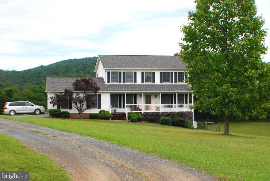 Welcome to Serenity! IMMACULATE 3 Bedroom custom built home on 5.73 acres-4 board and american wired fenced & surrounded by mountains & great views. Hardwood floors accept ceramic in Kitchen, Breakfast room & baths. Family Room w/wood burning stove. Watch the deer & your horses from the large rear deck or the covered front porch. Basement partially finished with its own Movie Rec Room & storage.