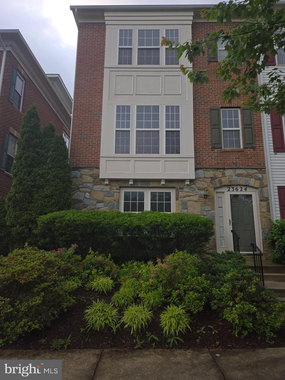 Enjoy this elegant end-unit home in sought-after Clarksburg Town Center. Features include a brick and stone exterior, abundant natural light, bay windows, 42" kitchen cabinets, gas fireplace, 9-foot ceilings, cathedral ceilings in bedrooms, hardwood floors, Berber carpet, and many upgrades. Includes a 2-car garage and is close to the pool, schools, shopping, and I-270.