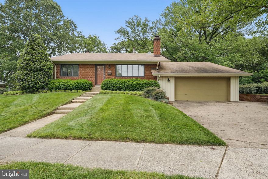 A Fairfax City Show Stopper... beautifully  renovated and expanded four level split with two car attached garage. With a touch of a Contemporary flare, this Fairfax Towne Estates home  is set to impress.  Ideally located just two blocks from City Hall and minutes from George Mason University and Main St.  Enjoy all the Events and Celebrations  that Fairfax City offers throughout the year.  This home sets the standard for Curb Appeal.  The manicured lawn looks like a carpet of green.  Much of the landscaping is hardscape so requires minimal maintenance.  And don't miss the fruit producing fig tree.  Entering the  home you r eyes are drawn immediately upward to the two story vaulted ceiling in the living room and den.  The living room features two custom designed work stations.  Perfect  for the work from home parents or the hard studying student.  A wood burning fireplace  makes  this an ideal place to drift away in your favorite novel,.  The den or 5th bedroom completes this main level.  Just a few steps up you find three well appointed bedrooms and renovated full bath with solar tube.  The main and bedroom levels are enhanced by the original oak hardwood floors.  As you travel down to the first lower level ,  you get the first glimpse of you own private Oasis.  The four sets of sliding glass doors opens directly to the huge deck  partially covered by an amazing pergola.  An extension of your FR and DR living space this is an entertainers dream.  Stepping back inside this level with an open floorplan is the central living space of the home.  The kitchen serving as the center of it all allows the Cook In The Kitchen to be included in all of the happenings of the banquet sized DR and spacious FR.  Never missing a moment of Family gatherings and Holiday dinners.  The gourmet kitchen with soft close doors, tons of cabinet and counter space features a Jenn Air stove with gas cooking and electric oven.  The best of both worlds.  There is a breakfast bar,  small appliance corner garage and built in space racks to keep everything organized . A powder room  is conveniently located just down the hall.  The Primary Bedroom is also located on this level.  This spacious room allows space for a sitting area accommodating a chaise lounge chair.  The huge walk in closed is equipped with double hung bars and shelving for shoes.  The adjoining full  bath has a walk in shower  with a hand held and wall mount showers. The entrance to the garage is also on this level.  But wait there is one more level .  Here find a bonus room that could be used for multiple purposes.  Game Room,  Art Room, Home Gym or Theater.  The laundry and utility room shares this level.  This is a home you will not want to miss.  Two major renovations in 1974 & 1992 have kept the design of this home  relevant for today's active family.