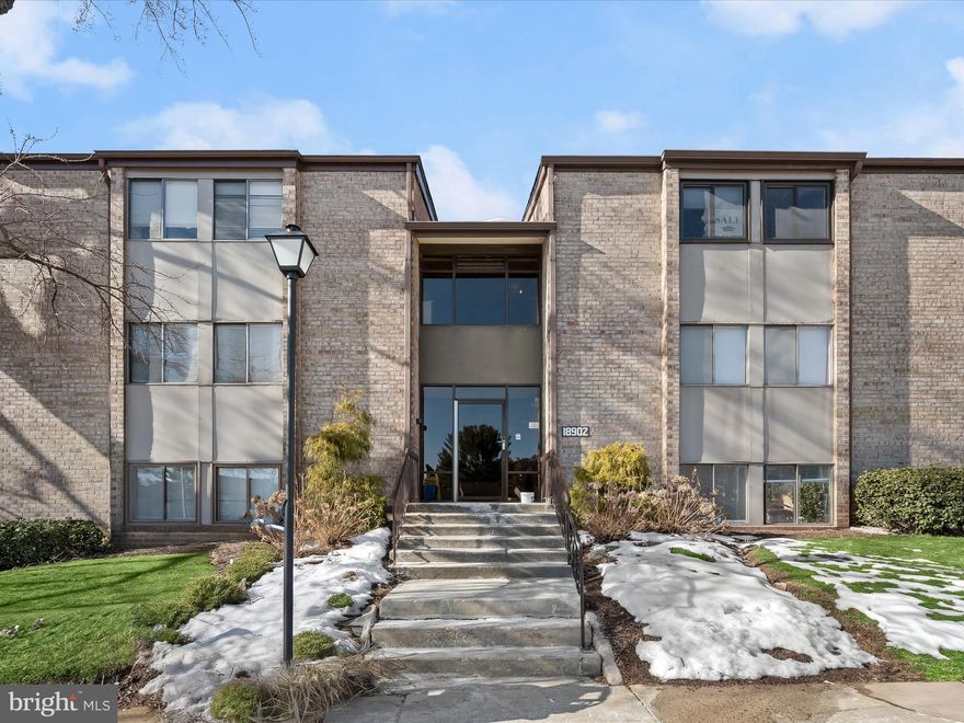 Welcome to this first-floor condo in the sought-after Heron’s Cove community offering three bedrooms and two full bathrooms in a prime location in the heart of Montgomery Village. Freshly painted in a light, neutral color, the home is filled with natural light, creating a bright and welcoming atmosphere. The open-concept living and dining areas feature oversized sliding glass doors that lead to a ground-level patio, perfect for relaxing outdoors. The kitchen, updated in 2023, boasts stainless steel appliances with gas cooking, granite countertops, a tile backsplash, a pantry, and a stacked laundry closet. Recessed lighting enhances the living room, dining room, and kitchen, adding a modern touch. Down the hall, the primary bedroom features a walk-in closet and a private bathroom with a tiled walk-in shower. Two additional bedrooms share a second hallway bathroom with dual sink vanities and a tub-shower combination. All three bedrooms have new luxury vinyl plank flooring. Enjoy the community’s outdoor pool and party room, along with a gazebo, walking paths and the G.W. Music Pavilion down the street. Montgomery Village provides an abundance of recreational amenities, including community centers, playgrounds, picnic pavilions, ponds, lakes, walking paths, athletic courts and fields, pools, social events and so much more! Centrally located next to Montgomery Village Shopping Center, this home offers easy access to a wide variety of shopping, dining, and entertainment. Commuting is a breeze with major highways like I-270, ICC 200, and MD 355 nearby, as well as public transportation options, including RideOn bus service and the Shady Grove Metro station just 15 minutes away.