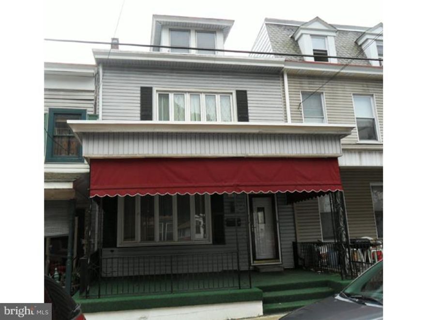 Move right into this large home or easily convert to a two unit. Full bath off the parlor on the first floor, 10x8'8 bath with 10x4'9 dressing area on second floor. Fully applianced eat in kitchen on first floor. First floor laundry. Large bay window in living room allows for lots of natural light. 20'4x19 living room on second floor, 15'3x17 eat in kitchen on second floor. 1 car built in garage with electric opener. Large front porch.