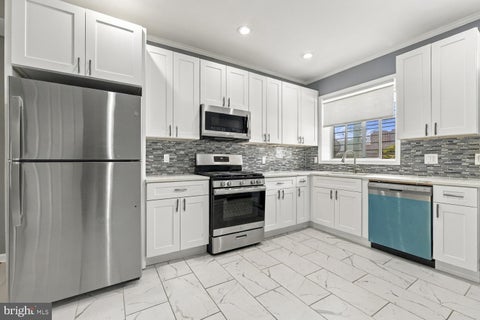 Photo of 1014 N Patterson Park Avenue, BALTIMORE, MD 21205 (MLS # MDBA2235192)
