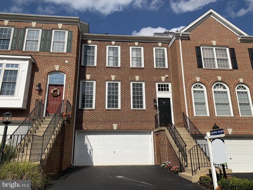 Beautifully updated 3 bed / 3.5 bath townhome in sought after Governors Grove.  As you enter this lovely home you will first notice the wall of windows that allow natural light to flood the spacious living room.  A neutral color palette and fresh modern engineered hardwood plank flooring will easily allow you to envision your own furnishings moving right in.  The kitchen features granite counters, stainless steel appliances, 42" upper cabinets, ample storage, and a breakfast bar / counter.   This open floorplan allows a visual sightline from the front living room to the back family room, which showcases a cozy gas-fireplace and opens to a brick patio.  Once upstairs, you will be impressed with the enormous owner's suite featuring vaulted ceiling, walk-in closet, and a spa-like bath with glass-enclosed shower, a soaking tub, and dual-vanities.  The additional two bedrooms are generously sized and easily share the second full bathroom on this level.  The lower level, with garage access, offers a unique space with a convenient wetbar & small fridge.  The third full bathroom and a den complete the lower level.  Governors Grove is conveniently located just south of Old Town Alexandria with easy access to 95/495, Huntington Metro, Ft Belvoir, The Pentagon, and Washington DC.