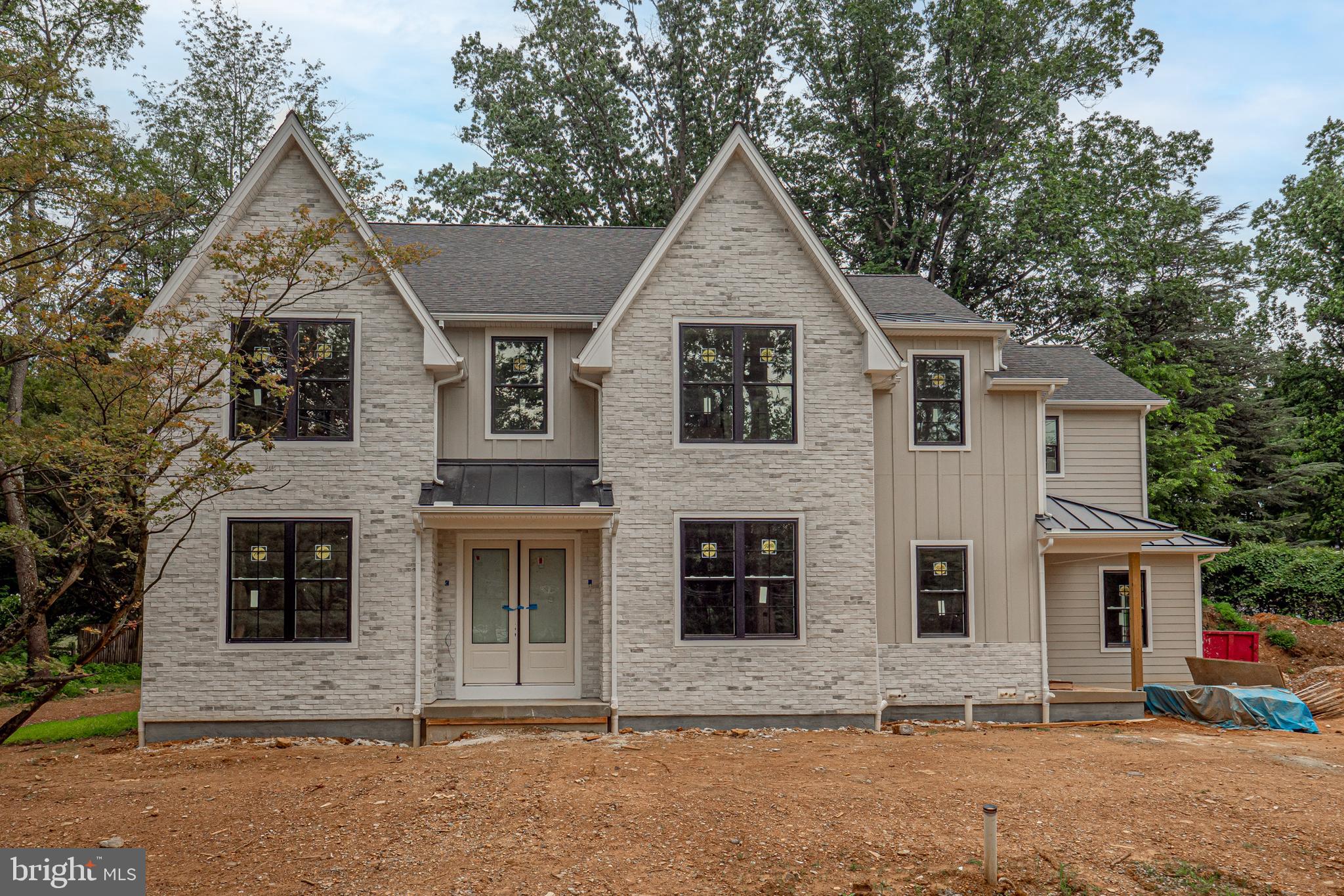 In the market for a luxury new construction home with a quick fall move-in? Step into luxury and experience the perfect blend of classic elegance and modern design in this exquisite new construction custom home built by renowned local builder Zappitelli Homes. Nestled on a private 1-acre lot in the highly sought-after Tredyffrin/Easttown School District, this architectural gem showcases timeless European influence paired with contemporary sophistication. Spanning over 5,900 square feet, this custom masterpiece delivers an unmatched combination of thoughtful design, luxury finishes, and an unbeatable location. With 5 bedrooms, 5.5 bathrooms, an oversized 3-car garage, and a fully finished lower level, every inch of this home has been meticulously crafted for luxury living and effortless comfort. From the moment you step inside, you’ll be captivated by the high 10' ceilings, sunlit spaces, and the seamless flow of thoughtfully designed rooms. At the heart of the home, a chef-inspired kitchen impresses with top-of-the-line Thermador appliances, custom cabinetry, quartz countertops, a large center island, and a built-in banquet for casual dining. A custom stove grotto, coffee bar, and great room bar elevate everyday moments and entertaining alike. Tucked just behind the kitchen is a fully outfitted scullery and walk-in pantry—complete with its own refrigerator, sink, dishwasher, and a convenient Costco door to the garage—offering the ultimate in function and luxury. Upstairs, retreat to the serene primary suite featuring a spa-style bath with a freestanding soaking tub, dual vanities, a large walk-in shower, and a generous custom closet. The second level also includes a guest suite with a private bath, a princess suite with its own ensuite, and two additional bedrooms joined by a beautifully appointed Jack-and-Jill bath. The finished lower level adds even more flexibility with space for a gym, media room, home office, and a full bathroom—perfect for guests or quiet escapes. Located in a quiet, sought-after neighborhood, this exceptional property is just minutes from top-rated Main Line dining, fitness centers, shopping, and major commuter routes. This is more than a home—it’s a custom-designed lifestyle crafted for those who expect the very best. Early Fall 2025 Settlement!