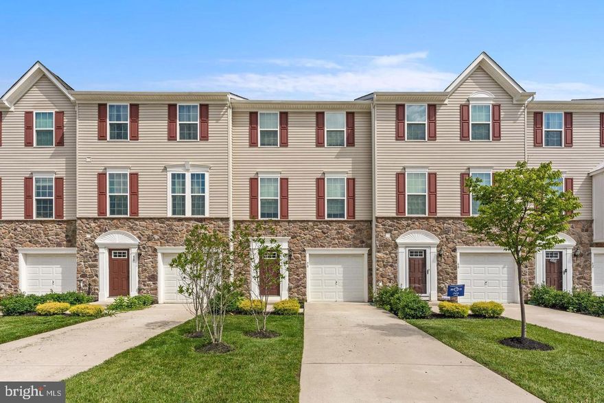 Welcome Home! This beautiful 4-year-young townhome is nestled in the highly sought-after Fox Run community and offers three levels of stylish living.
Step inside to find a spacious family room with recessed lighting, a convenient half bath, and sliding glass doors that lead to the backyard—perfect for indoor-outdoor living.
The second level showcases gleaming wood floors and a stunning eat-in gourmet kitchen featuring granite countertops, abundant white cabinetry, a pantry closet, center island with bar seating, recessed lighting, and a full stainless steel appliance package. The open layout flows seamlessly into the living room, creating an ideal space for entertaining.
Upstairs, the primary suite impresses with a tray ceiling, walk-in closet, and a luxurious bath complete with dual sinks and an oversized tile walk-in shower. Two additional generously sized bedrooms with neutral carpeting and ample closet space share a full hall bath. A conveniently located laundry closet completes this level.
Additional highlights include an attached one-car garage with interior access, a private patio overlooking natural views, and easy access to major commuting routes, trains, buses, shopping, and dining.