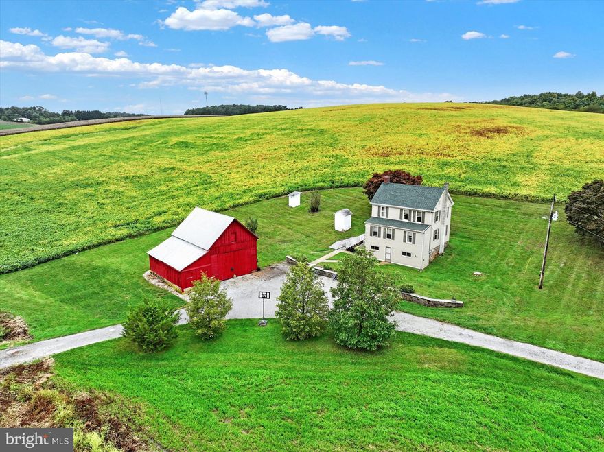 Start your dream homestead or simply relax and enjoy 360 degrees of natural Southern York. Co. beauty in this 59+ acre farm and charming 3 bedroom farmhouse with an updated full bath and open floor plan, ready for your personal touches. 40 acres of tillable land, 11 acres of woodland, 7.5 acres of pasture area, and 1 acre home site offer plenty of space to put down your roots and grow.  The farmland was tended by the Wolfe Brothers for many years so the land has been managed well. Currently being farmed by a local farmer so crops are reserved. Tucked away off the beaten path, but minutes to small town New Freedom, MD Line, NCR Trail, Pretty Boy Reservoir, I-83, shopping and conveniences. Move on in just in time for spring sowing!