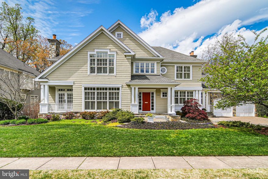Nestled on a quiet cul-de-sac in one of Arlington’s most sought-after neighborhoods, Rock Spring, this stunning Shingle Style home offers an exceptional blend of classic design and modern updates. With a welcoming flagstone front porch and a generous front yard, this home radiates curb appeal and neighborhood charm. The street’s shared basketball hoop adds to the friendly community vibe, making it the perfect place to call home.

Step into a bright, inviting foyer with soaring ceilings and an elegant wrapped-riser staircase. Beautiful oak hardwood floors, detailed crown mouldings, and a modern color palette create a warm, sophisticated atmosphere. The expansive family room is anchored by a striking Carderock fireplace, custom built-in shelving, and floor-to-ceiling windows that flood the space with natural light. Step outside onto the private oversized deck with serene views.

Enjoy the beauty of a large eat-in kitchen featuring a Joanna Gaines–inspired island that offers abundant space for cooking and gathering. Solid oak Shaker-style cabinetry provides a modern yet timeless look, with milky white upper cabinets complemented by gray-washed oak lower cabinets. Appliances include a Russell gas range cooktop with six burners, a commercial hood, Sub-Zero refrigerator, double ovens, and built-in microwave. Rich granite countertops tie the design together, while a double-door pantry and built-in desk offer added functionality. An ideally placed butler’s pantry provides service and storage for the formal dining room, complete with corner glass windows and space to easily seat 10 guests.

The formal living room is lined with a wall of windows, and privacy is offered by custom plantation shutters. A charming library features custom bookshelves and a cozy fireplace—perfect for curling up with the latest Dan Brown novel. A tucked-away powder room provides privacy and convenience, while the thoughtfully placed mudroom allows easy access to the oversized two-car garage and serves as a practical entry point to keep daily essentials organized.

The large upper level includes four spacious and bright bedrooms with high ceilings, designer carpeting, and oversized windows. The primary suite is a true sanctuary, featuring tray ceilings, large transom windows, and custom built-ins. The expansive and enviable dressing closet is outfitted with bespoke storage solutions and a charming hexagon window for natural light.

The spa-like primary bath is designed for ultimate relaxation, with dual vanities, elegant lighting, a large soaking tub framed by corner windows, and a separate glass-enclosed walk-in shower. A private water closet completes the space. The generous secondary bedrooms are well-proportioned and versatile, offering a dual-entry bath and an en suite bedroom with its own full bath.

The fully finished walk-out lower level is perfect for both entertaining and everyday living. The spacious recreation room is ideal for movie nights, watching sports on a big screen, or serving as a private guest retreat. Bedroom five enjoys legal egress and access to a shared full bath, making it ideal for visiting friends or an au pair. A custom-built 500+ bottle wine storage system and a large unfinished mechanical room offer exciting potential for a home gym, craft studio, or play area. The large laundry area provides ample seasonal storage and is conveniently located on this level.

With quick access to I-66, Langston Boulevard, and the George Washington Parkway, commuting to D.C. is easy. Ballston Metro is just 10 minutes away, and nearby shopping and dining options include Lee Heights, Ballston Quarter, and Chesterbrook Center.

Outdoor lovers will enjoy Potomac Overlook Park, plus walkable access to WGCC and Rock Spring Park.
Surrounded by tree-lined streets, top schools, and everyday conveniences, 3102 N Dinwiddie St offers the perfect blend of suburban calm and city connectivity.