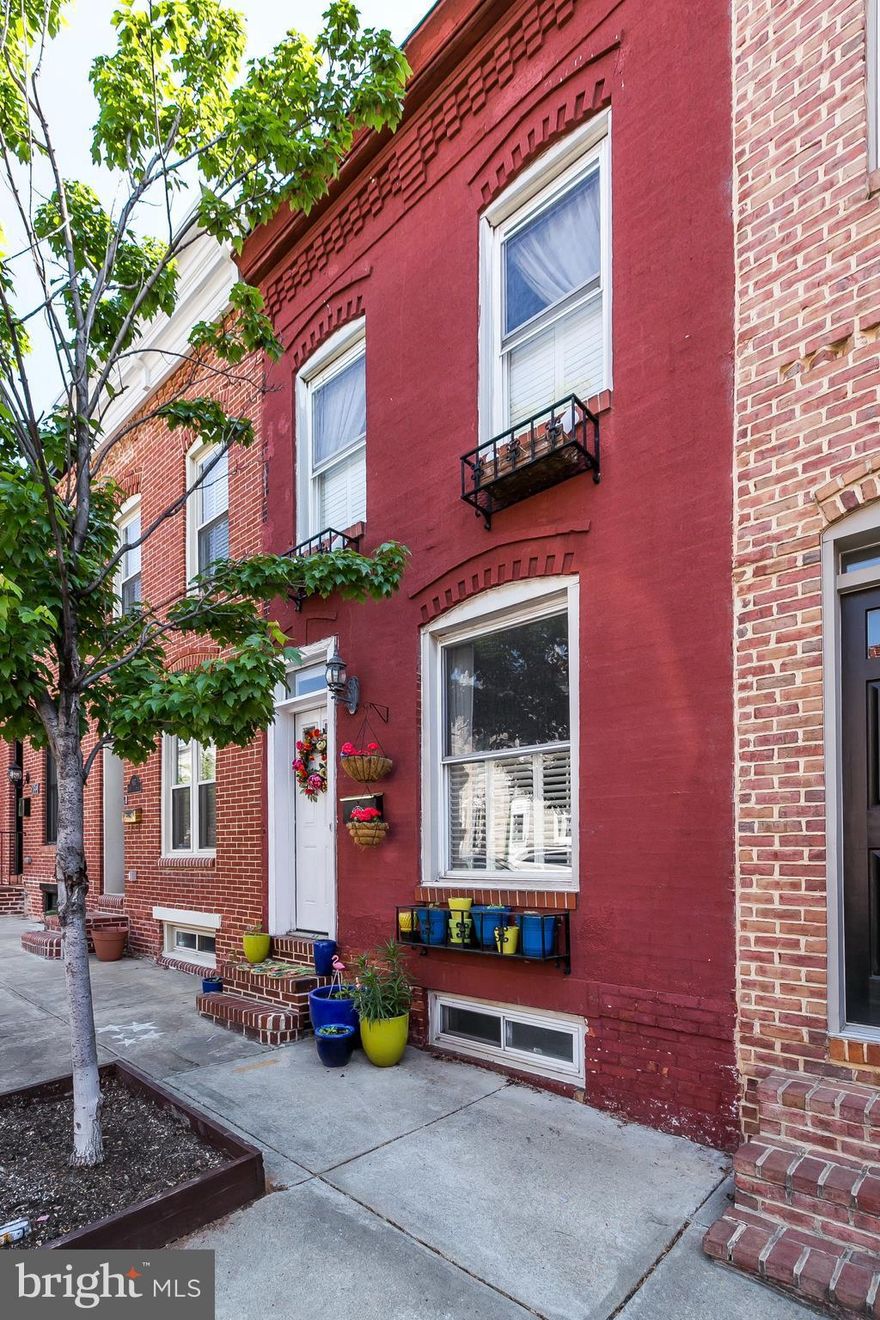 This centrally located home has some really great attributes, like two very generous size bedrooms, a centrally located bath, and a half bath off kitchen w/ laundry.The basement is mostly finished with an unfinished portion in the rear. Wood floors on main and upper level and PARKING! It could use some love in the kitchen and bath, thus the pricing. Seller wants to sell AS IS!