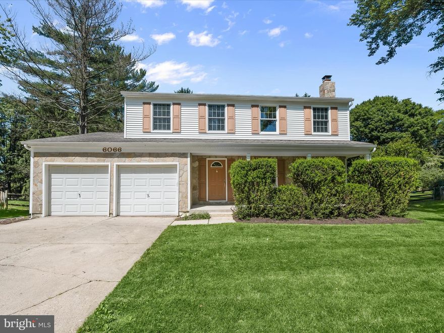 Tucked away on a peaceful .43-acre lot in the heart of Columbia, this beautifully maintained home backs to a lush line of mature evergreens, offering privacy and natural charm in every season. A covered front porch with stone accents sets a warm and welcoming tone, while a screened porch at the back invites relaxed evenings surrounded by nature. Inside, freshly painted walls in soft, neutral hues create a calming atmosphere from the moment you step through the door. The living room greets you with gleaming hardwood floors, multiple windows on every wall, and a floor-to-ceiling stone-accented fireplace that becomes the heart of the space. Flowing seamlessly from the living area, the formal dining room features stunning windows, bathing the room in natural light and lending a sense of timeless elegance. Function meets comfort in the kitchen, where granite countertops, stainless steel appliances, and a sunlit breakfast nook with bump-out windows create a warm, inviting space overlooking the fenced backyard. Just off the kitchen, the family room offers a perfect gathering spot with clerestory windows and skylight that fill the room with daylight while maintaining privacy, and a sliding glass door opens directly to the screened porch, blending indoor comfort with outdoor living. Upstairs, the spacious primary suite offers a restful retreat complete with a built-in vanity, a walk-in closet, and an en-suite bath featuring a granite-topped vanity and a glass-door shower. Three additional bedrooms, each with hardwood floors, share a well-appointed full bathroom with a double-sink vanity, providing plenty of space for family or guests. A convenient laundry chute adds a thoughtful touch of everyday ease. The lower level adds even more versatility with a finished recreation room and a utility room that houses the laundry area. Outside, a large patio and expansive, fenced backyard offer endless possibilities for play, gardening, or outdoor entertaining.  Ideally located, this home provides effortless access to Columbia’s best amenities, from serene lakes and scenic nature trails to shopping centers, the Mall in Columbia, Merriweather Post Pavilion, Downtown Columbia, schools, and major commuter routes including US-29. A true blend of comfort, style, and convenience, this home has it all.