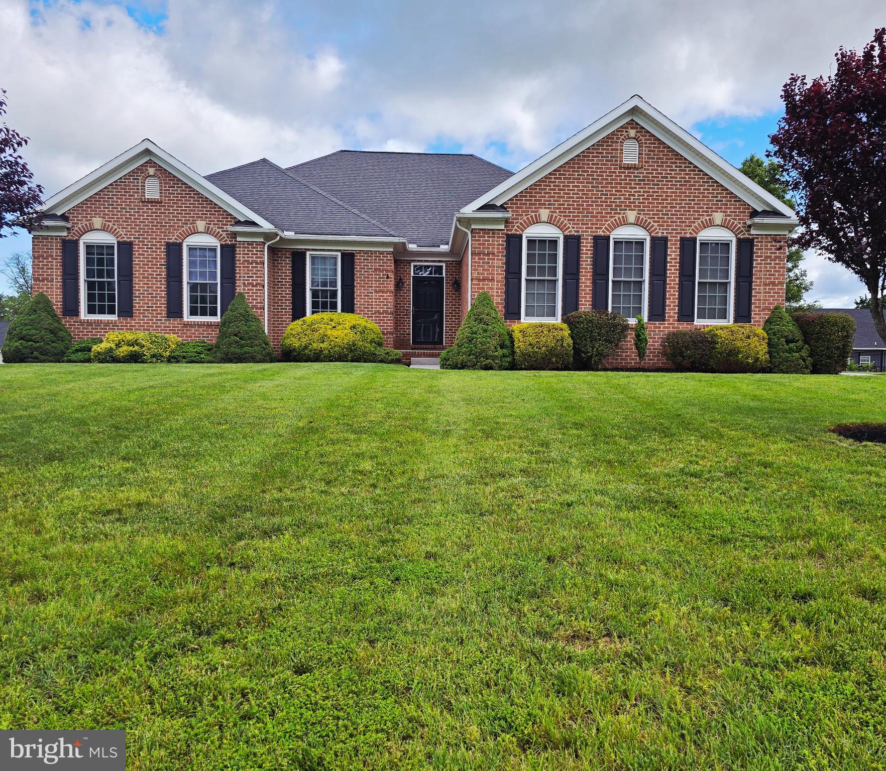 Come home to this beautifully upgraded ranch-style home with full in law quarters that you've been waiting for! Located next to the Hanover Country Club and golf course, you'll find Country Club Heights. Step into the hardwood foyer and take a look at the enormous great room with a soaring cathedral ceiling and gas fireplace. The kitchen is a dream especially for entertaining with granite countertops, 42" cabinets, hardwood floors, pantry, and room for everyone to gather around the island, bar, and open dining area. The hardwood floors extend to the open dining room which is open to a bright sunroom that leads to the Trex deck and spacious back yard complete with a shed. A conveniently placed laundry room sits between the kitchen and oversized 2-car garage with a laundry sink included. The home offers a large primary suite, big walk-in closet, bath with double sinks, a soaking tub, and a separate shower. Two more bedrooms, one with a walk-in closet and another full bath complete the first floor. Walking to the bright walk out lower level you will find the entrance to the in-law suite which is practically another whole house complete with a full kitchen, bar, dining space, family room, two large bedrooms, one with a walk in closet and a third room which could be used as an office, playroom, or additional bedroom, making that a total of six bedrooms! There is also a full bathroom and an additional flex room currently being used as a gym. There is still plenty of room for storage in the storage area along with a walk-in pantry! The lower level also has its seperate mini split system making the heating and cooling in this area a breeze. Some of the amenities include 9' ceilings, a charging station in the garage for an electric vehicle, Hardie Plank siding, a full brick front plus brick to grade all around, 2x6 construction, and a 24'x23' garage. Come see it while it lasts!