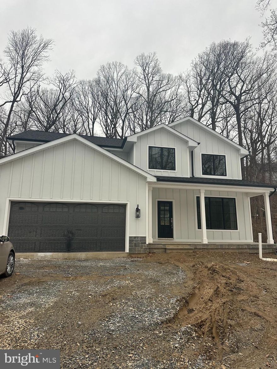 We are 30 days or less to completion!  After months of working with the township, installing new water & sewer from the street to the house- we are ready!
Stunning custom new construction home with wooded views in Malvern!!! Excellent location, private yet close to all that Malvern Borough has to offer. Your eyes will immediately go to the see through fireplace upon entering the foyer.  Well thought out floorplan is open with every square foot being utilized.  Kitchen opens to the family room with walls of windows. Covered porch off of the kitchen is beautiful, see through gas fireplace for living room and family room brings a cozy feel. Four bedrooms, 3 full baths & 2 powder rooms plus a finished basement! Anderson windows throughout, this builder spared no expense.  There is nothing "builder grade" about this gorgeous home. Please see Bosch Appliance Package included from Gerhard's.