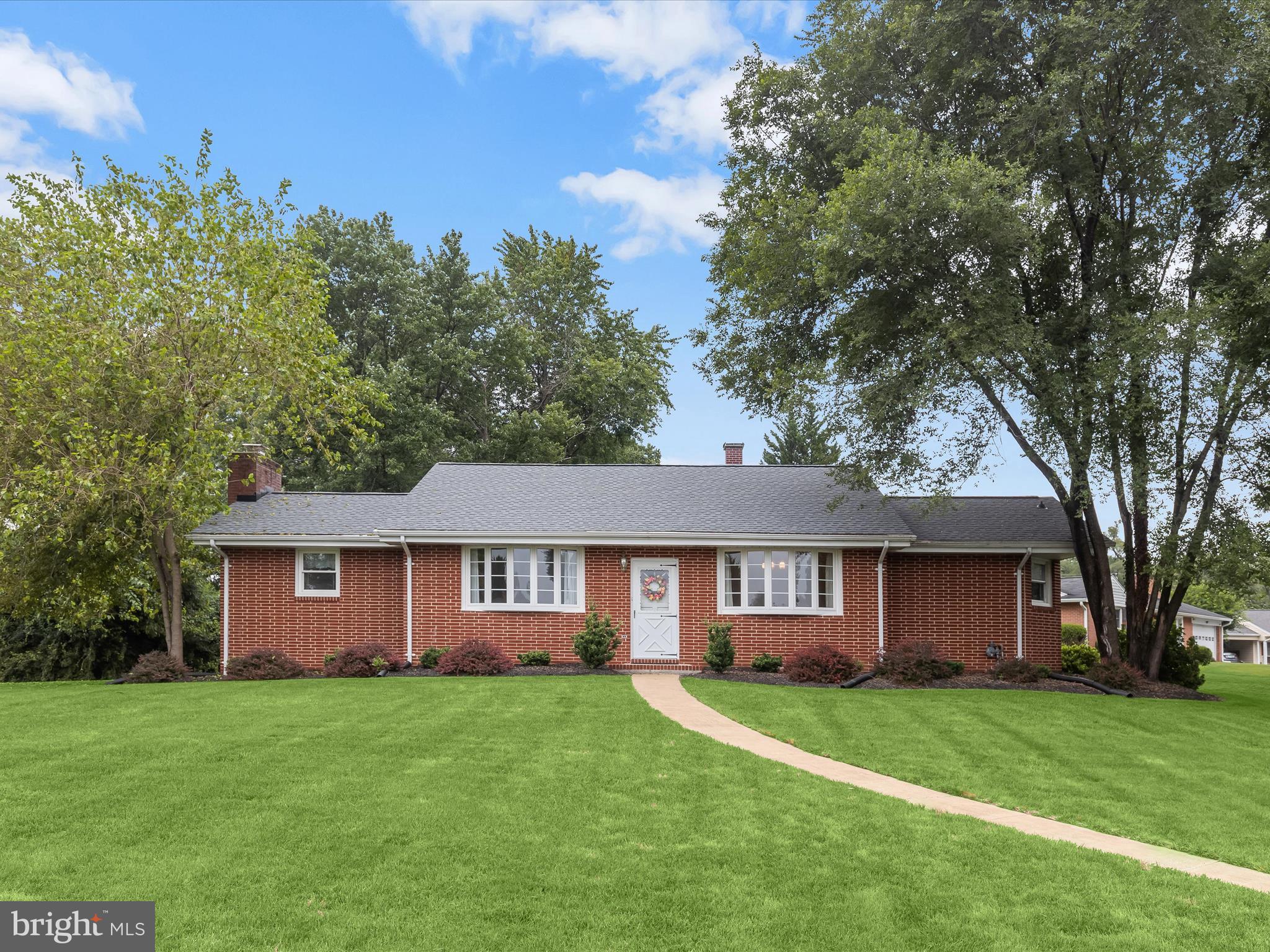Respectfully, asking for offers by Monday, the 11th at Noon. The seller is flexible on closing and does not need a rent back. Beautifully maintained all-brick rancher nestled on a desirable corner lot in one of Ellicott City's most sought-after communities. This 3-bedroom, 2-bath home has been lovingly cared for and offers timeless charm, comfortable living, and thoughtful updates throughout. Gleaming hardwood floors run through all bedrooms, the spacious living room, and the formal dining area, complemented by a neutral color palette.
The large kitchen features ample counter space, newer stainless steel appliances, and opens to a bright and inviting sunroom, perfect for morning coffee or a quiet read. All three bedrooms are generously sized with hardwood flooring and share a well-appointed hall bath. The finished lower level boasts a large recreation room with brand-new LVP flooring and a wood burning fireplace, a second full bathroom, and two sizable storage rooms. Additional features include a floored attic with shelving, a patio for outdoor enjoyment, and updates to the A/C and roof. All this in a fantastic location with easy access to major commuter routes, shopping, dining, and entertainment!