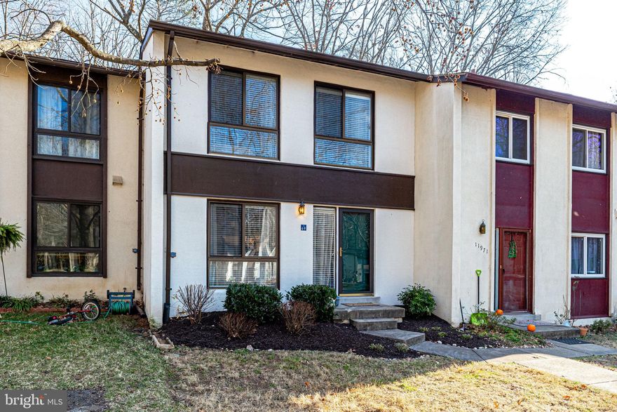 Offer deadline 12/30 @ noon *Three finished level townhouse with loads of updates.  Entry foyer with hardwood leads to the separate living room and dining room with hardwood floors.  The kitchen has oak cabinetry, stainless appliances and hardwood floors .  New carpet upstairs where you find a primary suite with walk in closet and a secondary bedroom with closet.  The primary bath has updated lighting and mirror/medicine cabinet.  Lower level is finished with new carpet.  There is a bedroom with closet and a full bath as well as a utility/laundry room and rec room.  Walk out leads to a fenced yard backing to trees.  New HVAC 2014, New roof 2017, Re-pipe house 2018, Programable thermostat 2020, new carpet 2021, fresh paint 2021.  Great location near Metro, Reston town center, shopping , restaurants, entertainment and major commuter routes like the Dulles Toll Rd and the  Fairfax County Parkway.