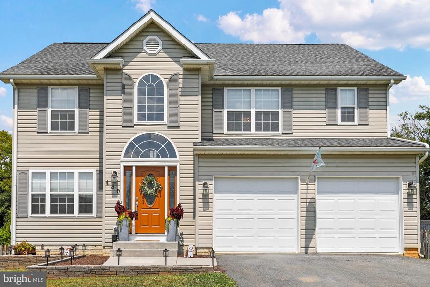 Welcome home to this large three bedroom, two and a half bathroom home on the largest lot in the Summer Hill neighborhood in Martinsburg, WV! This home features an open concept main level with a separate dining room, cathedral ceilings in the family room, an overlook from the upstairs to the family room, upgraded countertops, stainless steel appliances, a large deck with an attached canopy, attached two car garage, full basement ready for your own touch, laundry on the upper level, and was completely updated in 2021. What more could you ask for? Close to the regional airport, major commuter routes, shopping, and schools, this home has it all! Schedule your private tour today, before it's too late!