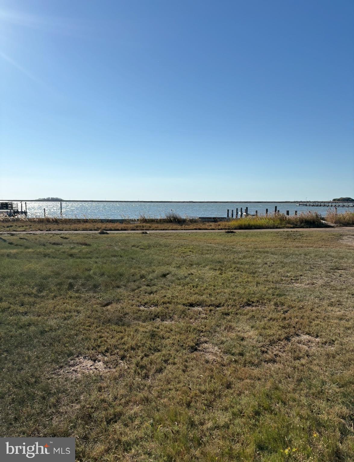 Opportunity to own two vacant lots together, parcels 9 and 14 situated directly on the waterfront located on an island in the middle of the Chesapeake Bay. This scenic property is in the small village of Tylerton, Smith Island, Maryland. The lots are cleared and offer panoramic views and the most beautiful sunsets on the island! Listing Includes two lots with water views from the front and back of the property. The property had a trailer on it at one time. Water and sewer should be available for hook up. Buyer to use due diligence in permitting and land use.