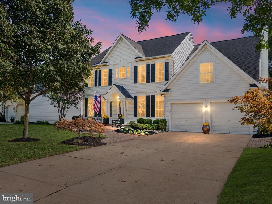 Welcome to 6209 Gatepost Way, a beautifully upgraded Molly Pitcher model located in the highly sought-after Lyndwood Manor community of Elkridge. This stately colonial offers nearly 3,000 square feet of refined living space above grade and 4,304 square feet of overall space (see floor plan in the photos), with an additional fully finished walk-out basement with full bath—perfect for entertaining, working from home, or creating a personal retreat. With over $205,000 in thoughtful improvements, this home has been meticulously maintained and extensively upgraded by its long-term owners. Notable highlights include a complete gourmet kitchen renovation, a luxury primary suite bathroom remodel, and a stunning family room transformation featuring custom-built-ins and updated flooring. Upstairs, you'll find four spacious bedrooms, including a serene primary suite with a spa-inspired bathroom and a custom walk-in closet.

The main level offers formal living and dining rooms, a sun-filled breakfast area, and a cozy family room with a wood-burning fireplace, all featuring elegant finishes like refinished hardwood floors, crown molding, and upgraded lighting. The finished basement expands your living space with a large recreation room, a built-in Bar, an additional room, a full bath, and ample storage. Step outside to enjoy the serene backyard oasis, complete with a Trex deck, professional landscaping, and a full irrigation system. Surrounded by The Timbers at Troy Golf Course, while the rear offers a private retreat—truly the best of both worlds.

Additional upgrades include a tankless water heater, upstairs air conditioning, a newer roof, and extensive hardscaping. Located just minutes from shopping, dining, Route 100, and I-95, this home combines convenience with comfort in one of Howard County’s top-rated school districts. With its ideal location, high-end improvements, and timeless style, 6209 Gatepost Way offers an exceptional lifestyle opportunity—don’t miss your chance to make it yours!