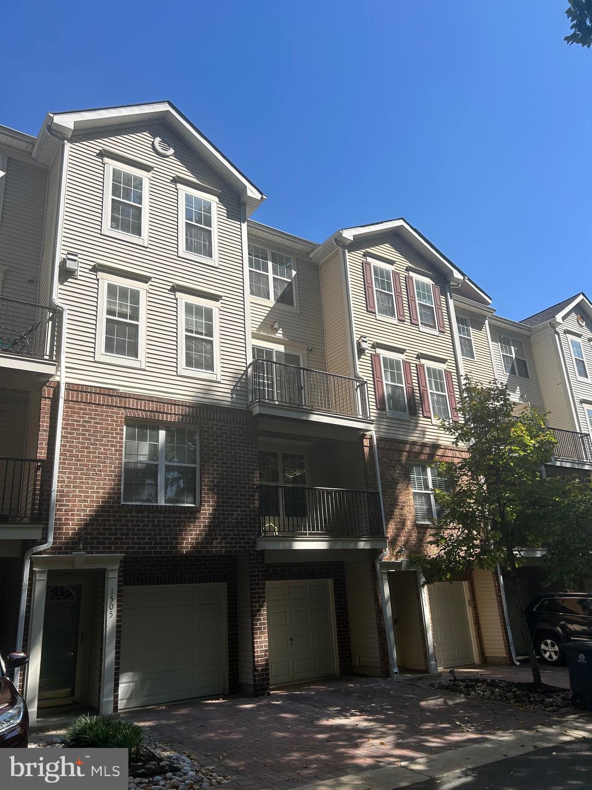 Unique floor plan with this 4 level townhome style condo with one car garage. New carpet and paint so this home is move in ready!! Two areas to entertain guest along with a dining room with deck off of the kitchen. Community pool and close to Woodmore shopping center and major highways. Listed for sale $399,900, rent with option to buy available