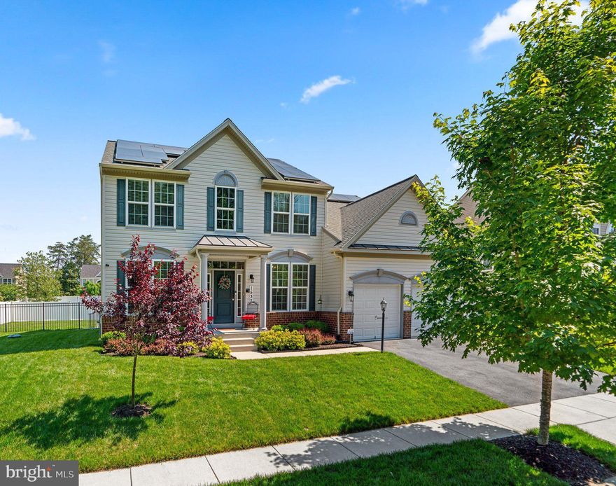 BACK ON THE MARKET and IMMEDIATELY AVAILABLE!   MOVE IN BEFORE THE START OF THE NEW SCHOOL YEAR!  Previous buyer’s financing fell through giving you the opportunity to own this spacious and extremely well cared for home with over 4,500 square feet of living space.  This home was built in 2014,  is  situated in the Coldwater Reserve community, and offers the perfect layout for entertaining family and friends!   Upon arriving you will find a lovely, manicured lawn with an irrigation system, and a spacious backyard that invites your imagination for new outdoor living ideas and enjoyment.   As you enter the home, you will find a spacious foyer, hardwood flooring, 9 ft. ceilings, recessed lighting, crown and chair moldings,  custom blinds, and separate living and dining rooms.  Enjoy entertaining and preparing meals in the open kitchen with 42” cabinets offering ample storage, granite countertops, stainless steel appliances, a brand new dishwasher, separate pantry, and a sunroom/breakfast room that leads out to the backyard.   In the center of the home, you will relax in the extended family room with recessed lighting, a gas fireplace, and wiring and mount for a TV.    The main level also offers a first-floor library, perfect for a home office!   The upper level features a spacious owner’s suite with sitting area, generous walk-in closet, and an en suite bathroom with soaking tub and separate shower.   The upper level also features three additional bedrooms and a full bath.  The lower level has an outside rear entrance, a recreation area, a full bath, and a very spacious bedroom with an egress window, walk-in closet, and full bathroom making it perfect for a nanny, in-laws, or guests.  The lower level is extended under the family room, and features a storage area, an additional room, and a studio that is pre-wired for a home theater with boxes in the ceiling for speakers, a subwoofer pre-wire, and wiring for a TV on the wall.  The roof was replaced in 2022 and has solar panels that are owned and transferable to the new owner.  The home offers an open floor plan design with lots of natural light, neutral tones throughout, is move-in ready and just waiting for your personal touches.