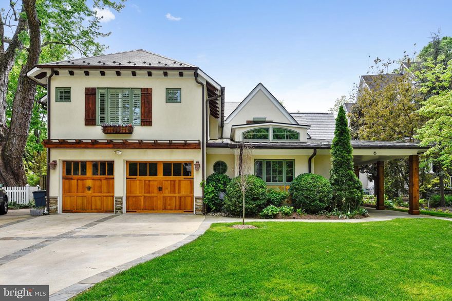 5,500 sq ft of extravagant interior living space! 6 bedroom, 6.5 bath Napa-style home on cul-de-sac in the Village of Chevy Chase. Old world charm combined w/ modern luxury: superb stone work, Heart of Pine floors, beamed, coffered and vaulted ceilings. Dramatic entry, chefs kitchen, den, mudroom, + 4 fireplaces! Pool, hot tub, patio and 2 car garage.