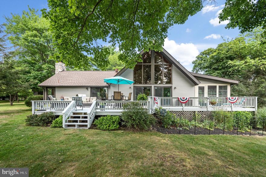 Welcome to your dream retreat in The Woods Community! This meticulously maintained home offers over 2100 square feet of living space with the serenity of nature all around. Built for comfort and convenience, this home has been thoughtfully updated with a new roof, gutters, and siding in 2017 and a new HVAC system in 2018. For peace of mind, a Generac home generator is included, ensuring you're always prepared. But that's not all - make sure to check the list of all the other updates on this home. Walking in the front door, you will enter the great room which features a stone wood fireplace with several built in cabinets, the room is accentuated by vaulted tongue and grove wood plank ceilings. Cozy up to the newly upgraded gas fireplace to stay warm in the winter season. The kitchen has been tastefully modernized with new flooring and lighting, creating a welcoming space for your cooking needs.  Enjoy your large deck (installed in 2018) overlooking the Mountain View golf course, specifically the fourth fairway and green, or sip your coffee in your relaxing 3 seasons room! The main level features a primary bedroom and a completely updated bathroom, emphasizing easy main level living with the washer and dryer just around the corner as well.  Head upstairs to enjoy the space of 2 additional bedrooms and a full bath. Need more space for your creative edge? This home includes a fully finished detached studio, perfect for unleashing your creativity—whether you envision it as a hobby space or workshop - you'll be taking the word 'she-shed' or 'man-cave' to a whole other level.  Conveniently attached to the studio is the garage which gives plenty of space for parking and storage. Situated on a spacious lot of over a half acre, this property boasts an existing beautiful garden area, inviting you to relax and unwind outdoors. Beyond the home itself, ownership includes a Class A Indoor/Outdoor/Golf membership to The Woods Resort, offering an impressive array of amenities. Enjoy access to championship golf courses,  and relax at two outdoor pools, an indoor pool, and numerous tennis, pickle ball, basketball, and racquetball courts. Stay fit at the private fitness center. The Woods Resort is ideally located less than 2 hours from the D.C./Baltimore Metro Area, adjacent to the expansive Sleepy Creek Wildlife Management Area. This 23,000-acre park provides opportunities for fishing, boating, hunting, and hiking along 70 miles of scenic trails, ensuring outdoor adventures are always close at hand. Don't miss this opportunity to own a meticulously updated home in a vibrant resort community where luxury, comfort, and natural beauty converge. Schedule your showing today and envision life at its finest at 1245 Winter Camp Trl!