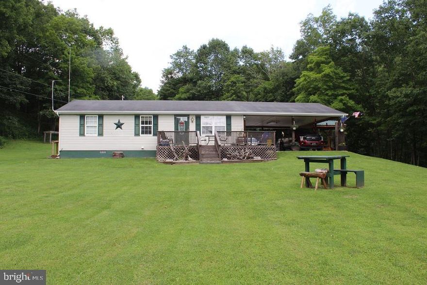 Nice Rancher located in the beautiful Seneca Rocks area of WV.  This home has an open floor plan, plenty of kitchen storage and laminate floors throughout living area. Two-car carport and a 24' x 32" Metal Bldg., great for a workshop!