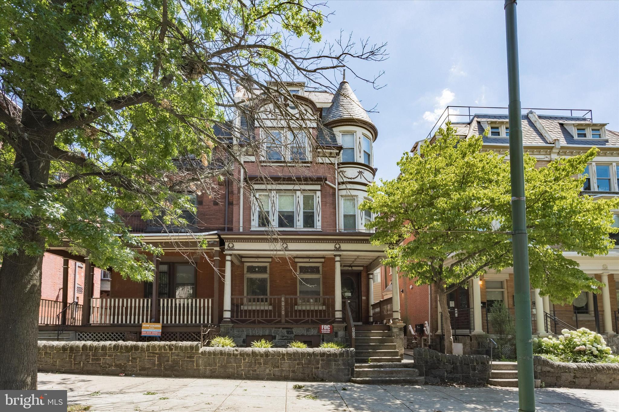 Welcome to 4030 Spruce Street! This majestic and well-maintained porch-front property is located just steps from the University of Pennsylvania campus and includes off-street parking off the alley in the rear. With original details and many updates throughout, this property makes for a wonderful investment (lease was recently renewed for $8600/mo. ending 6/30/24). The first floor includes a tiled vestibule entrance, spacious living room and parlor areas, a large dining room with back staircase, and an over-sized kitchen with stainless steel appliances, gas vented range, powder room, and access to the rear yard and parking area off the alley. The second floor features four bedrooms and a hall bathroom with a stall shower. The third floor includes an additional four bedrooms with hall bathroom, a linen closet, and attic access. The owners have made many updates to make the home compliant with university requirements and have been diligent in regards to maintaining the property. There is a sprinkler system, updated electrical (200 amp + sub panels), dual system/zone HVAC systems, 50 gallon Bradford-White water heater, and two sets of washers and dryers in the basement (which also provides plenty of storage). Landlord currently pays the water bill (averages around $175/mo.) and the Tenants pay all additional utilities.