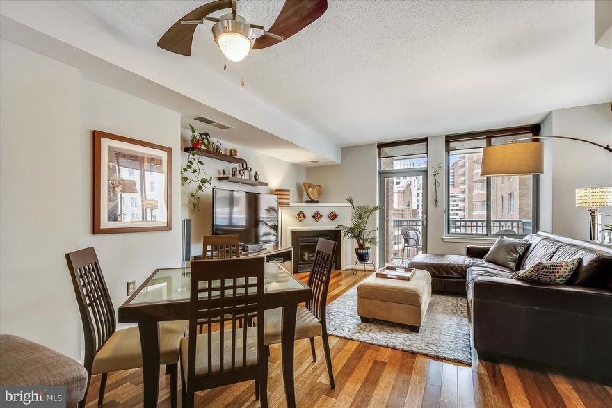 Stunning & spacious (1 bedroom + den) unit full of natural light, tucked away from the street on the quiet side of the Continental Condominium in the heart of Ballston including a private balcony for additional space to unwind from the daily grind.
  
1 oversized Garage parking space.  Light & bright open concept floorplan.  New on-trend Bamboo and Tile Flooring throughout. Gourmet Kitchen: Granite Countertops, Shaker Style Cabinetry with bonus pull out shelves & roll outs. New GE Stainless Steel Appliances including: 5 burner Gas Stove, French door Refrigerator w/ ice maker in the door, Dishwasher & Microwave.  New plumbing lines installed in kitchen as well as a new Garbage Disposal. 

Retreat to the primary bedroom suite complete with blackout roller shades,  walk-in closet outfitted with organization system and convenient, space saving barn door.   Luxurious bathroom recently renovated with modern finishes, designer tile (wavy high gloss subway w/mosaic accents), walk-in shower,  glass slider and vanity (dovetail drawers) w/ quartz countertop.  Schluter complete shower waterproofing system, comfort height, sleek toilet and Kohler fixtures. 

Multi-functional Den set up as an office with built-ins/guest room with a Full Size Murphy Bed and Shelving System in Closet for additional storage. 
New Designer Light Fixtures and Ceiling Fans throughout.  Newer Washer/Dryer in unit.  Corner Gas fireplace & large display mantle.  Entire unit freshly painted in neutral tones. Hot Water Heater and HVAC replaced in 2020. Unit already wired for Verizon Fios!
 
Amenity rich building features include: tastefully designed lobby level w/ beverage station, Concierge, secure package storage, Theatre, Club Room, Billiard Room, Business Center, Fitness Center, 24 HR Concierge/Security Desk, Bike Storage & Recycling Area.  ***Condo fee includes-water, sewer, trash & more! 
Beware! *** Rooftop Envy Alert *** Enjoy dining al fresco, lounging with family, neighbors & friends by the Pool, conversation around the fire pit, or spark up the grill for year round Q.  Last but not least, be sure to take in the gorgeous, panoramic views from the 21st floor. 
 
Vibrant Ballston is the place to be in the DMV! 1 block to the Ballston Metro & Ballston Quarter development.  Endless shopping, dining & nightlife just outside your door.  Easy access to bike trails, Route 50, 66 & 395 and many other major commuter routes.  Near Marymount University, George Mason's Law School & Virginia Tech.  Harris Teeter within walking distance.

Contact listing agent for additional details or to set up a private tour. OPEN HOUSE SUNDAY, FEB 13th from 2-4pm!  There's no place like HOME!