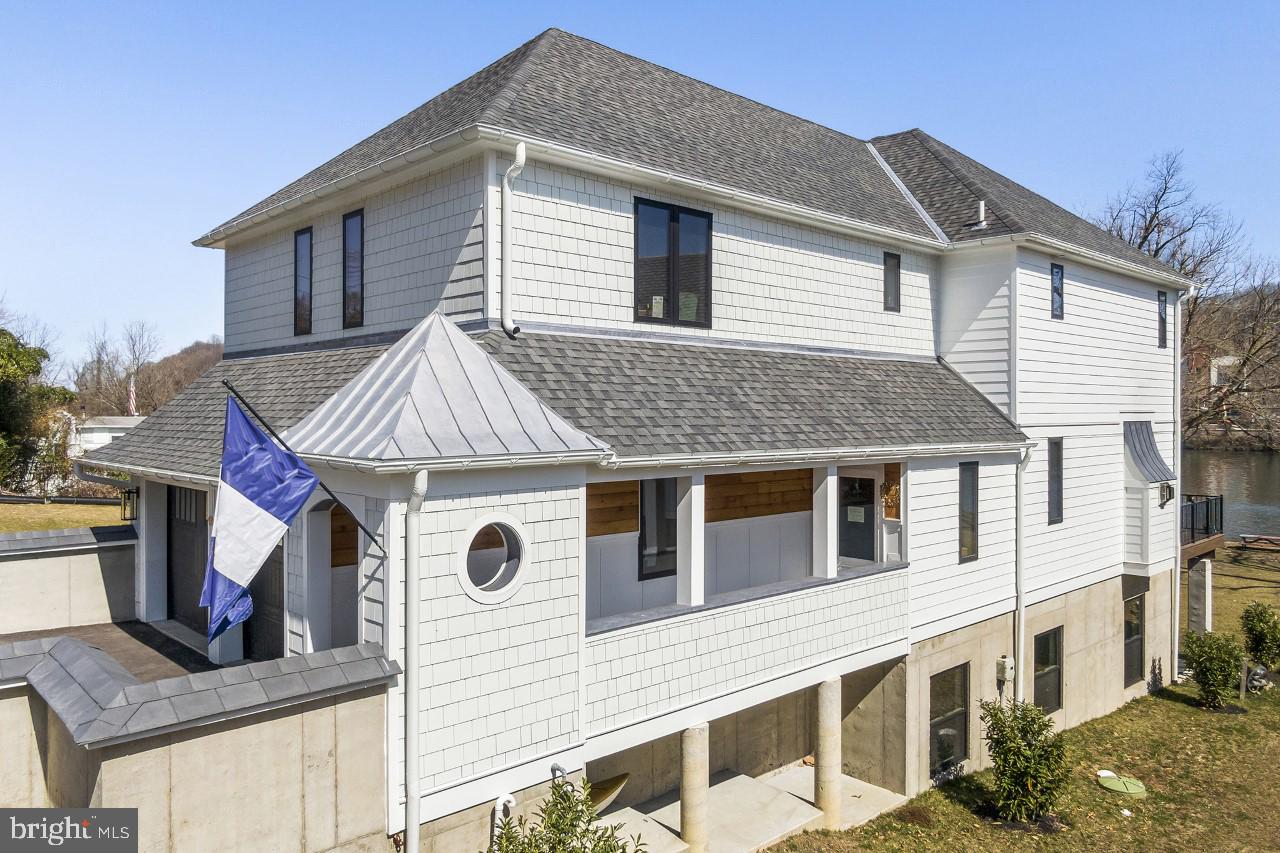 To Be Built NEW CONSTRUCTION: Enjoy the Staycation Lifestyle of this Urban Chic RIVER FRONT NEW Home: 4-6 mos Delivery. 4 BR, 2 1/2 bath custom NEW home with unobstructed views of the Schuylkill River, high-end architectural detail and striking Contemporary loft styling. Soaring 10 foot ceilings, floor to ceiling batten board trimmed accent walls and wide plank white oak flooring lend a modern twist to renowned architect Fred Bissinger's nautical interpretation of modern water-front living in this expertly built Rufo Properties home. The elegant Chef's kitchen is anchored by a large island and has the feel of an urban loft, but with a wall of windows, a huge walk-out deck and the view of a weekend waterfront retreat. Sumptuous master suite with Juliete balcony and river view, walk-in closet and spa-like master bath. Fourth bedroom adjacent to the master also with a water-front view is perfect for an in-home office. Exceptional location with easy, stress-free 15 minute commute to Center city via W. River Dr., access to Pa Turnpike, Rt. 476 and all in Lower Merion School District. Interior design and finishes by Z Domas of Phila. Photos are of a similar home and include some upgrades.