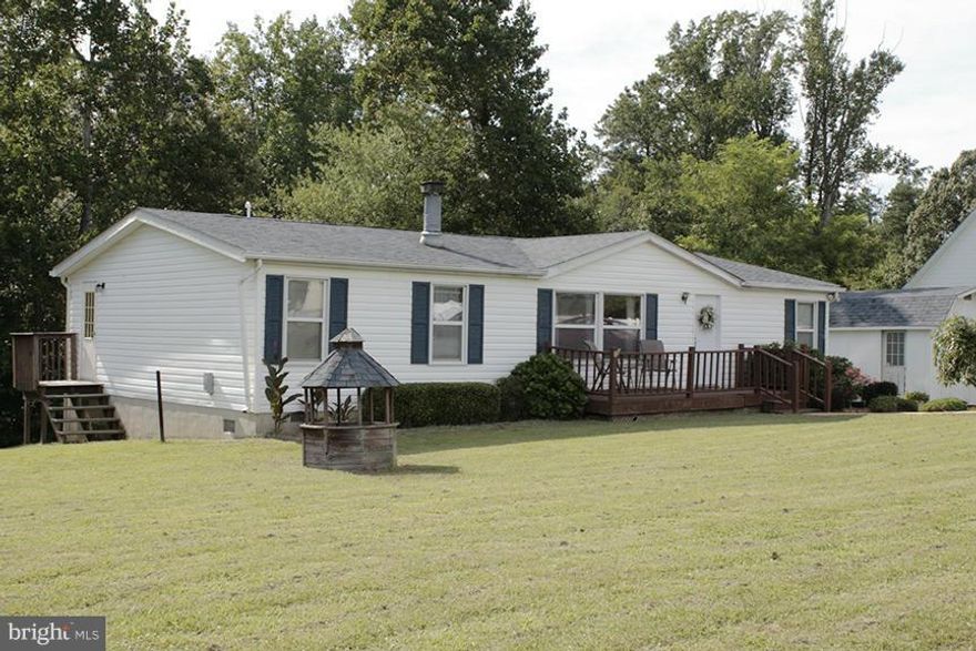 Country living in a great location on more than an acre! Beautiful rambler with open floor plan and freshly painted inside.  Stylish kitchen with large island and newly painted cabinets. Home Warranty included. Great home for a great price! Financing available at Wells Fargo.