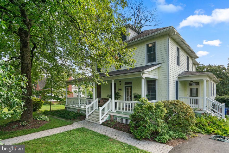 Nestled on a spacious, serene lot in the heart of Catonsville, this beautifully maintained and updated home offers the perfect blend of classic charm and modern convenience. The quiet street is lined with mature trees, and the lush landscaping surrounding the property provides a tranquil retreat. 

A large wrap-around front porch greets you, offering a welcoming spot to relax and enjoy the neighborhood. Inside, you’ll be impressed by the stunning, refinished hardwood floors that flow throughout the home, complemented by custom Andersen windows that bathe the interior in warm sunlight. The main level has a spacious living room with elegant pocket doors, offering the option for privacy when desired. Through a second set of pocket doors, the formal dining room offers ample space for large gatherings and special occasions. Directly across from the living room, a versatile room awaits your vision, perfect for a home office or library. Just down the hall, before entering the kitchen you’ll find a set of custom built-ins and a ventless gas fireplace the perfect spot to curl up with a book.

The heart of the home is the well-appointed eat-in kitchen, featuring stainless steel appliances, a glass tile backsplash, and labradorite countertops. The breakfast bar provides additional seating, and the expansive bay of windows offers a picturesque view of the backyard garden. Adjacent to the kitchen is a generous family room, perfect for entertaining or simply unwinding, with a wall of windows that flood the space with natural light. Convenience is key on the main level, which also includes a mudroom with access to the driveway, a conveniently located half bathroom, and a laundry room just off the kitchen. 

Upstairs, the primary suite is a true sanctuary, with two spacious walk-in closets and an ensuite bathroom featuring a walk-in shower with a glass enclosure, a luxurious soaking tub, and a double vanity. Two additional large bedrooms and a second full bathroom complete the second floor. All three rooms on this level feature hardwood floors. The third floor offers a recently updated fourth bedroom, complete with fresh carpet and paint.

The outdoor space is just as impressive as the indoor space in this home. Stepping out, you’re greeted by a large paver patio with plenty of space for a table, grill and hot tub (patio pre-wired for hot tub). The lush landscaping allows for privacy in the backyard while still maintaining an open area for play sets or yard games. The backyard is fully fenced, which allows your furry friends to have space to roam, and includes a large storage shed.

This home is conveniently located near Catonsville's vibrant farmers markets, music festivals, shops, and restaurants, and just up the street from the newly renovated Catonsville LIbrary - you'll have everything you need just minutes from home. Close to major employers such as UMBC, Social Security, CCBC, Fort Meade, and BWI, commuting is a breeze with easy access to major routes including 695, 95, 195, and 70. Verify school information on the Baltimore County Public Schools website.