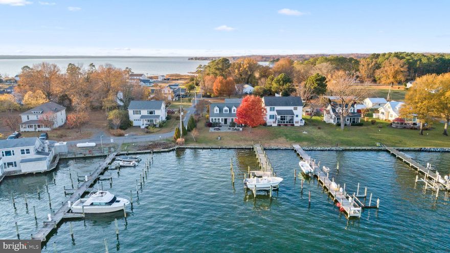 A new year means a fresh start and what better way than with a gorgeous new home!!
This stunning waterfront home in Broomes Island sits on roughly ½ acre and features a brand-new private pier with electric, water, and a boat lift, plus a 2.5-car detached garage. Originally built in 1930, the home has been thoughtfully updated over the years while preserving the charm and richness of its original wood floors and classic architecture.
Inside, the main level offers:
• A spacious eat-in kitchen • Full bathroom • Separate laundry room • Cozy gas fireplace • Charming front porch • Expanded living room—formerly the back porch—with a full wall of windows showcasing breathtaking Island Creek & Patuxent River views.
A main-level flex room—currently used as a home office—can easily serve as the third bedroom, offering beautiful water views and convenient main-floor living options.
Upstairs, you’ll find a cozy reading nook overlooking the creek, along with two bedrooms, one with an ensuite bath.
Outside, enjoy mature landscaping, a spacious patio with a built-in fire ring, and a wide open lawn leading to your newly constructed pier. The oversized garage & large, flat yard provide excellent space for recreation or parking for cars, boats, and outdoor equipment—perfect for the active, waterfront lifestyle.
Located in highly desirable Calvert County, known for its top-rated schools, low taxes, and easy commute to D.C., Pax River, and Annapolis. Enjoy nearby marinas, waterfront restaurants, parks, beaches, and an endless list of outdoor activities. This is your chance to own a classic yet updated waterfront retreat in one of Southern Maryland’s most sought-after riverfront communities. Homes like this—especially with brand-new piers—rarely become available.