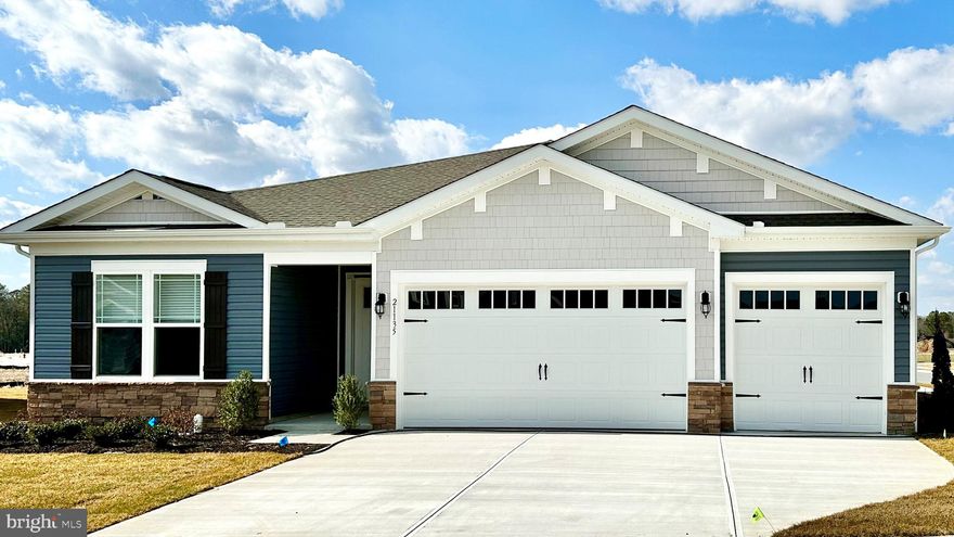 Discover a new home in Headwater Cove at 34003 Skyflower Loop in Lewes, DE. This 2309 square foot Destin home is the last of its kind on a cul-de-sac with pond views and offers four bedrooms, three bathrooms, and a three-car garage. 

As you walk into this open-concept one-story home, the family-friendly gourmet kitchen includes an oversized quartz countertop island, stainless steel appliances, classic white cabinets, and a walk-in pantry. The large laundry room, tucked between the kitchen pantry and the three-car garage, also features a coat closet. 

This living space flows nicely into the dining room and great room with a tray ceiling that leads to the quiet porch in the back of the home. 

The owner’s suite, also with a tray ceiling, includes a toilet closet, double bowl vanity, and two walk-in closets. One guest bedroom is privately located in the front of the home with a walk-in closet and a full private bathroom. Additionally, the second and third guest bedrooms at the back of the home have a private hallway near a full bathroom and linen closet. 

The Destin comes complete a fully sodded, landscaped, and irrigated lawn, white window treatments and the exclusive America’s smart home® package. 

Pictures, artist renderings, photographs, colors, features, and sizes are for illustration purposes only and will vary from the homes as built. Image representative of plan only and may vary as built. Images are of model home and include custom design features that may not be available in other homes. Furnishings and decorative items not included with home purchase. Seller makes no representations or warranties that the view from the property will remain the same. Future development, growth of landscaping and the like may impact any views currently experienced from the property.