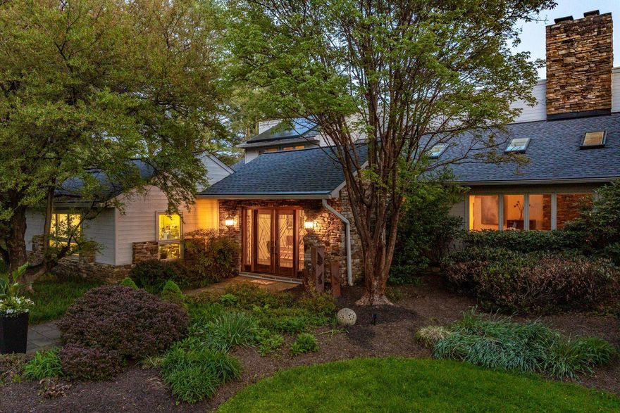 This striking contemporary home, set on almost four pastoral acres, features vaulted ceilings, skylights, floating staircases, and walls of windows. The design includes building materials that reflect the natural setting: floor-to-ceiling stacked stone walls and fireplaces, reclaimed wood beams, pine plank floors. With five bedrooms and six full baths, there is ample room to house and entertain family, friends, and guests. The vaulted primary suite has its own deck and a private bathroom that includes an oversized walk-in shower, soaking tub, dual vanity, and fireplace. Three additional bedrooms and two more full baths are spread out across this level. The finished lower level includes another full bath, bedroom, and living room - ideal for an in-law or au pair suite. Highlights on the main level include a vaulted great room with soaring ceilings, natural light, large stone fireplace, wall of built-ins, and access to the largest of several decks. The adjoining kitchen features alder cabinets, soapstone counters, stone backsplash, and stainless appliances. It adjoins an elegant dining room with pastoral views. At the far end of the main floor is a cozy library with custom cherry bookshelves - it too opens to a private deck. Near the library is a cooking studio and office, recently created by converting two of the four garage bays into conditioned space. The cooking studio could be converted into an art or woodworking studio, home gym, family room, or even into separate living quarters. The space has its own outside entrance, opens into the main level, and has convenient access to a full bath. Additional significant improvements include a new roof (2024), all new skylights (2024), and high-efficiency solar panels (2025). Energy savings on the 6,000-plus-square-foot home are estimated to be over $5,000 per year; the solar panels are owned and transfer to a new owner. The property includes a gunite in-ground pool (new cover 2025), six-person salt water hot tub (2025), fenced play area that doubles as a dog run, gazebo, and outdoor space for sport and exploration. There is ample room for vehicles with a two-car garage, parking area, and circular driveway. Enjoy lush landscaping, rolling hills, and the peace and quiet of country living just minutes from Hunt Valley Towne Center, the NCR Trail, Worthington Valley biking, and Oregon Ridge Park. Professional photos and floor plan will be uploaded soon!