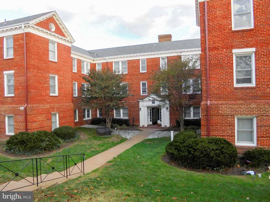 PRICE REDUCTION!! One of the nicest units I’ve ever seen in The Bearings. Unlike many units here, this one doesn’t face the noise of Washington Street.  One parking space assigned. Hardwood floors and crown molding throughout. Upgraded kitchen with black granite counters, slate floors, and updated appliances.  Bright and modern bathroom with bead board wainscoting. Remote light switching.  Ceiling fan in the bedroom.  Ample closet space including a walk-in and two additional closets in the bedroom.  Lots of natural light.  Upgraded blinds. Add a bus stop at the front door  (A few yards to the south is the express bus stop.  Its last stop before it gets to DC), local watering holes and restaurants within short walking distance, and the GW Parkway  bike/run/walk trail south to Mount Vernon and north to Roosevelt Island and beyond – all with an Old Town address – this unit is a catch.