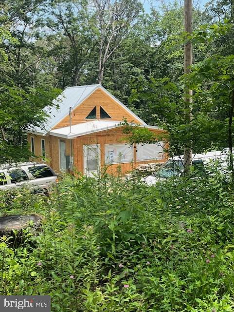 TIME TO RELAX ON 2 UNRESTRICTED ACRES WITH A YEAR-ROUND GUSHING SPRING, WHICH FEEDS INTO THE UNFINISHED STICK-BUILT CABIN! OWNER IS A BUILDING CONTRACTOR. FALCONWOOD SUBDIVISION IS A QUAINT & QUIET SMALL SUBDIVISION! CABIN LEAVES PLENTY OF OPTIONS TO COMPLETE THE INTERIORS AND MAKE IT YOUR OWN. THE ONLY SOURCE NEEDED FOR COUNTY-TESTED SPRING WATER, YEAR-ROUND. THERE'S A BLOCK FOUNDATION, FILLED WITH CONCRETE POURED INTO THE BLOCKS. SEPTIC FOR 3 BEDROOM IS INSTALLED, TOO. THIS PROPERTY IS OFF ON PAW PAW, NEAR THE CROSSINGS S/D AREA. EASY DRIVE TO CUMBERLAND, PAW PAW, CAPON BRIDGE AND SURROUNGING AREAS!