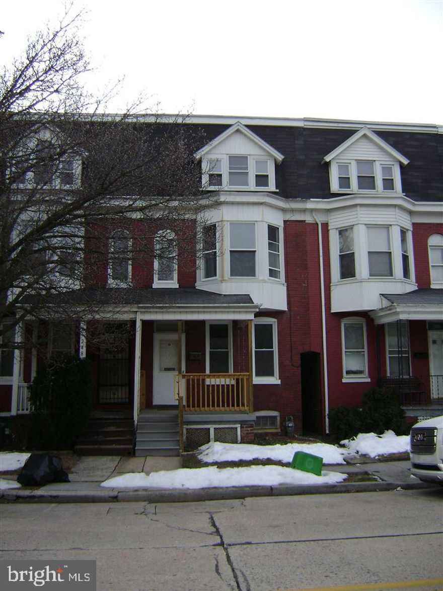 A must see property.  Beautifully remodeled kitchen, baths, laminate floors, trek decking, natural gas heat and off street parking in rear.  Assessment has been lowered for lower tax base.  Five bedrooms with carpet and closets in every room.