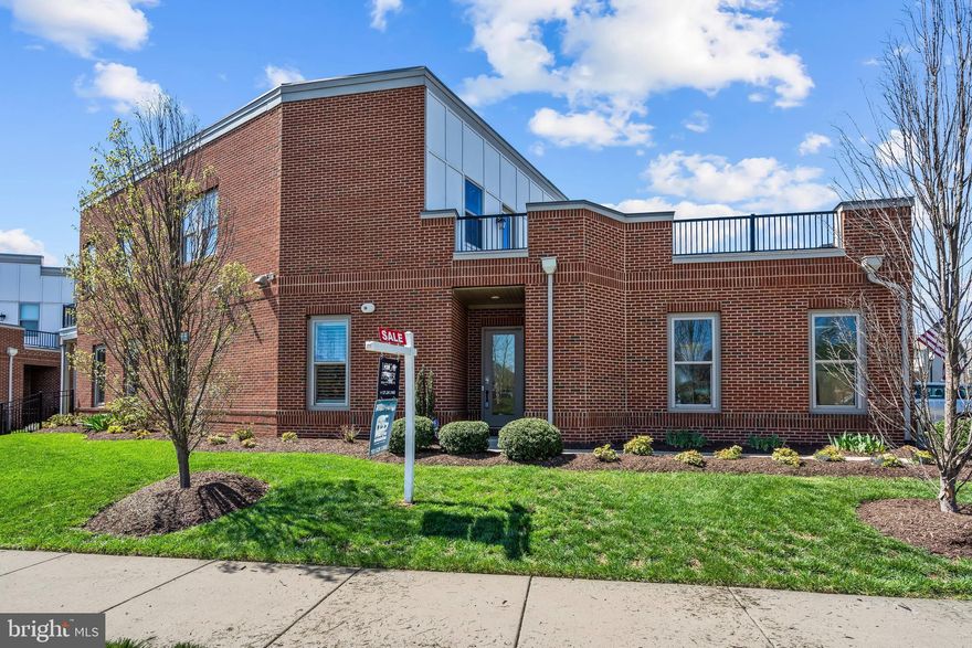 Beautiful 3 bedroom end unit former model townhome in the highly sought-after and amenity rich active adult community of Birchwood at Brambleton.  Two rooftop terraces! As you enter the open foyer, you will see the upgraded wide plank engineered hardwood flooring and plantation shutters throughout. The kitchen has upgraded granite countertops, stainless steel appliances, subway tile backsplash, gas cooktop, wall oven, pantry, and center island with breakfast bar. Whole house instant hot water. Just off the kitchen, you have the dining room/breakfast area. From here, you enter into the family room which has access to the covered patio and fenced rear yard. Upstairs (chair lift installed), you have 3 bedrooms and 2 full bathrooms. The washer and dryer are also upstairs for added convenience. The hallway full bath has been remodeled with a spacious tiled shower and frameless glass door. Bedroom 1 has a walk-in closet, ceiling fan, and extremely large rooftop terrace! Bedroom 2 also has a walk-in closet and roughed in for a ceiling fan. The primary suite has 2 very spacious walk-in closets, tray ceiling, full bath, and private balcony/deck area. The bathroom has 2 vanities, tiled flooring, soaking tub, and separate shower. The home has an attached 2 car garage with an epoxy floor, and storage system! The Birchwood HOA is loaded with amenities. Fios is included! You also have both, and indoor and outdoor pool. The clubhouse also includes a meeting room, kitchen ,art room, entertainment area, virtual golf, game room, and an exercise room.