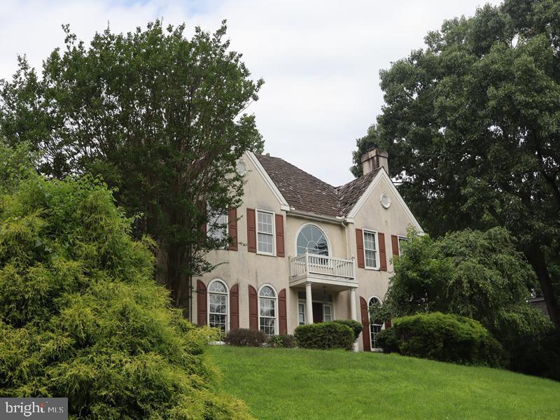 Grand Opportunity in Media French Colonial Residence Don't miss this stunning two-story French Colonial-style home, built in 1997 and set on a beautiful 1.04-acre lot in the desirable Media section of Delaware County. This residence offers a three-car garage and an array of elegant features throughout. Step into the spacious foyer, which flows into a formal living room with fireplace, a formal dining room, a modern kitchen, and a family room with an additional fireplace perfect for both entertaining and everyday living. The home boasts four bedrooms, three full bathrooms, and two powder rooms above grade, plus an additional powder room in the finished basement. Outdoor amenities include an inground pool, rear patio, and deck, providing the ideal setting for relaxation and gatherings.
Conveniently located just minutes from major roadways and a short drive into Philadelphia, this property combines timeless style with modern comfort and accessibility.