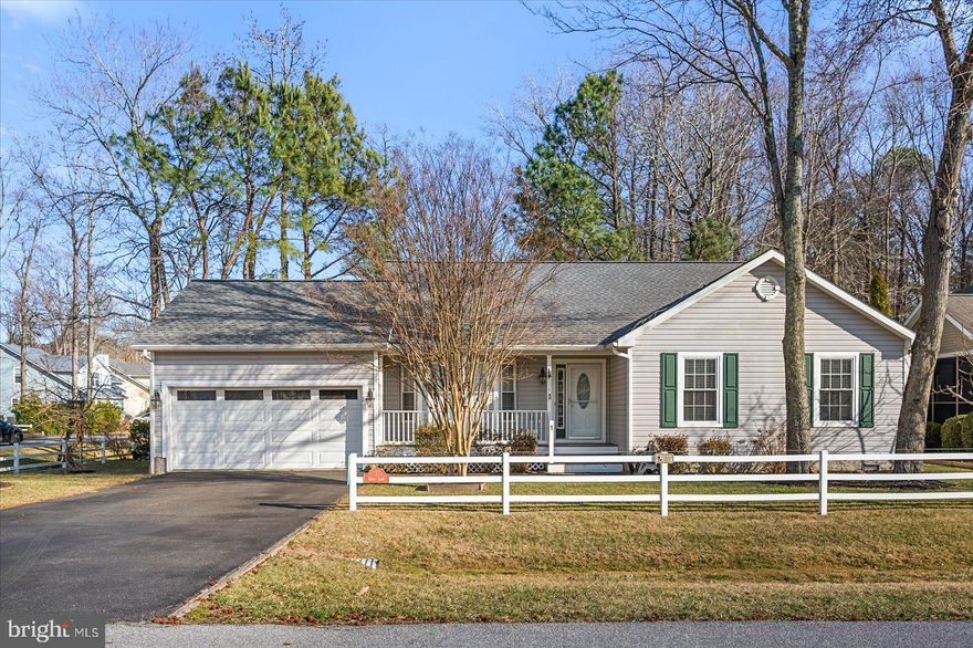 This well kept 3 bedroom, 2 bath  rancher is located on a corner lot at the Innerlinks in Ocean Pines. Home features cathedral ceilings in the Living Room, hardwood floors in foyer, living room, dining room and hallway. Kitchen has a large eat-in area, new refrigerator and gas cooking. Sunroom off the dinning room is for year round use and has large windows that open up to let the fresh air in. Step down to the deck where you can cook out or just enjoy all the birds and squirrels that love to play in the trees. Master Bedroom features and in-suite bathroom with a new walk-in tile shower,. 2 other bedrooms complete the living area. 2 car garage has a ramp that can be removed and access to a large floored attic. New Roof w/transferrable warranty installed May 2021, New washer Jan 2023, New refrigerator April 2024. Whole house has been freshly painted including all doors. frames and baseboards. All new hardware, fans w/lights in all bedrooms,  sunroom and kitchen. New carpet in all bedrooms , new bathroom lights and  new dining room light. Also a new addition is a washer/dryer hookup in the hall closet where you can add a washer/dryer stack if you would like. Current laundry area is in the garage. This home is ready to move in and available for a quick settlement.