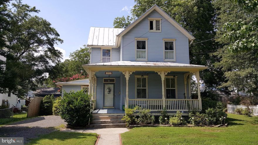 In Love with Yesteryear? Want to return to a quieter and gentler place where pride and family is evident. Where neighbors sit on the front porch and talk to one another.  We have the key to this charming 1917 historic home, where time has stood still and the home has been lovingly cared for throughout the years. From the front porch to the hardwood floors to the family sitting room, it's all here.