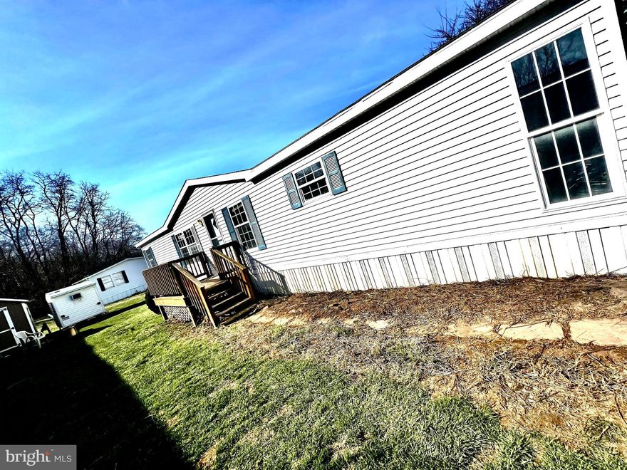 Welcome home to Rocky Glen Mobile Home Community! Conveniently located near I-81 with easy access to shopping, dining, and commuter routes into Maryland and Virginia. Enjoy the peace of mind of a private, gated community while embracing low-maintenance living. This spacious 3-bedroom home features vaulted ceilings in the living room, creating an open and airy feel, along with abundant natural light throughout the home.  A perfect blend of comfort, convenience, and affordability! 
Community Approval Needed. Home sold "as is".  HVAC does not work.