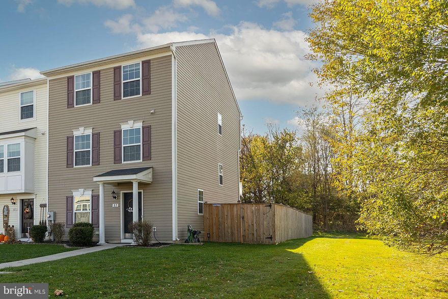 Located  in South Berkeley county this beautiful three level townhome is totally amazing!! The home is  on the end in the back of the community giving you privacy Enhanced by the fenced back yard and large patio. Beautiful LVP flooring as you step inside the front door with a large coat closet. Sitting area to the left that could double as a study, craft or play area. Extra space on the lower level ready to be finished as a recreation room, 4th bedroom, or continued to be used as storage. 3 piece rough in for future 3rd full bath as well! Upstairs you are welcomed by the gorgeous dark cabinets, black appliances giving you a seamless look, and kitchen island with overhang for stools. Breakfast nook is perfect for the kitchen table and a bonus 8ft morning room on the rear for extra entertaining space! There is also deck are off the morning room, perfect to just unwind from the day!!Topping off the main level is a Spacious family room and 1/2 bath for everyday convenience. On the 3rd floor, 2 secondary bedrooms with a shared bath are found just down the hall from the Owners suite. Owner's bedroom features a walk-in closet, deluxe owners bath with soaking tub and shower separate and dual sink vanities!