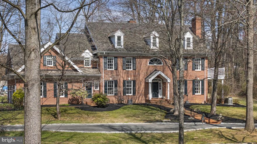 Welcome to 21 Bassett Hunt Lane—an exquisite estate nestled on a serene and private 2.7-acre lot in the heart of Glenmoore, located within the award-winning Downingtown Area School District. This stunning 5-bedroom, 5 full and 2 half bathroom single-family home offers the perfect blend of luxury, comfort, and timeless elegance. Step inside to a grand two-story foyer that sets the tone for the home’s impressive design. To the right, the formal living room is both cozy and refined, featuring a fireplace, abundant natural sunlight from expansive windows, and direct access to a charming side patio. To the left, the formal dining room exudes sophistication with detailed molding and a statement chandelier—perfect for hosting memorable gatherings. The heart of the home is the spacious kitchen, thoughtfully designed with ample cabinetry, a large center island, double ovens, a built-in desk area, and a wet bar. The adjoining breakfast area features sliding glass doors leading to the private back patio, creating seamless indoor-outdoor flow and offering picturesque views of your backyard oasis. Just off the kitchen, the inviting family room boasts vaulted ceilings, a fireplace, and carpeting—ideal for relaxing evenings. A private home office with built-in shelving and direct patio access provides the perfect work-from-home setup. Two conveniently located half bathrooms complete the main level. Upstairs, the luxurious primary suite is a true retreat. This expansive space features vaulted ceilings, a private deck, and a spa-like ensuite bathroom complete with a soaking tub and standing shower. A unique loft area with its own fireplace offers the perfect reading nook or lounge space. The primary suite is completed by a generously sized walk-in closet. Three additional bedrooms are located down the hall, each offering its own private ensuite bathroom for ultimate comfort and privacy. The partially finished lower level expands your living space with a cozy fireplace and versatile areas ideal for entertaining, a playroom, home gym, or more! A fifth bedroom and full bathroom provide excellent accommodations for guests, while the large unfinished section offers abundant storage. Step outside to experience your own private retreat. Multiple patios and decks provide peaceful spaces to relax and unwind, all overlooking the beautifully landscaped grounds. The rear brick patio leads directly to the in-ground saltwater pool—perfect for enjoying warm summer days in total privacy. Buy with peace of mind knowing there is a whole house generator! Tucked away on a quiet private street, this exceptional property offers the tranquility you crave while remaining conveniently close to Springton Manor Farm, local dining, shopping, and major roadways. This is a rare opportunity to own a truly remarkable home in one of Chester County’s most desirable locations! Scheduling your showing today!