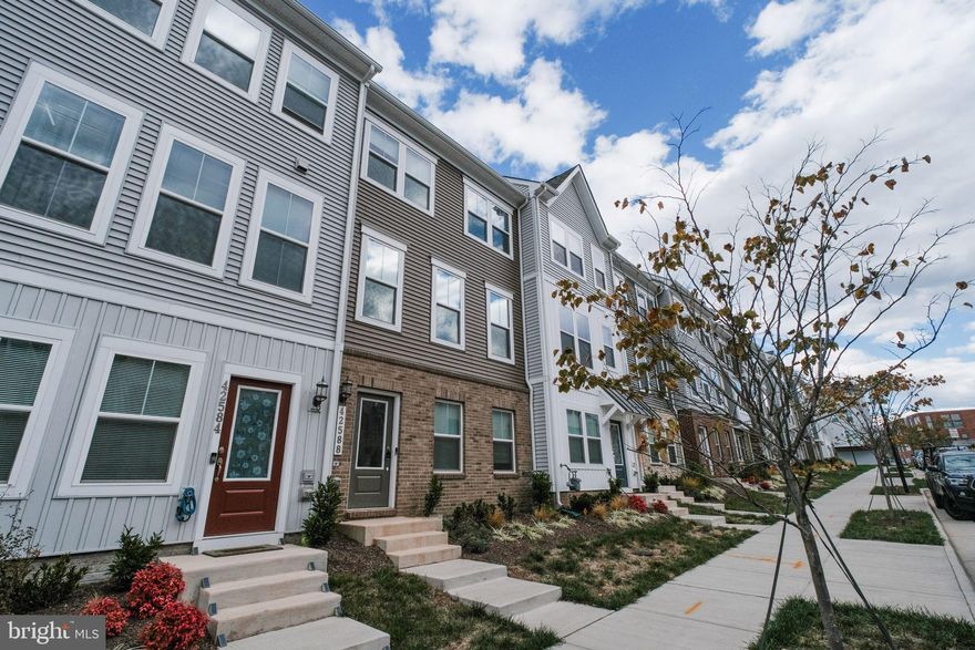 Welcome to 42588 Pitlochry Terrace in Sterling, VA — a stunning 2023-built townhome that perfectly blends modern luxury with everyday convenience. This beautifully designed residence features an open-concept layout, a gourmet kitchen with sleek finishes, and a two-car garage, all located within the sought-after Arcola Town Center community.
Enjoy resort-style amenities including a pool, clubhouse, and playgrounds, while being just minutes from Dulles Airport and major commuter routes like Route 28, Route 50, and the Toll Road. Elaine Thompson Elementary School is within walking distance, and everyday shopping is effortless with Walmart and Target both less than a mile away.
Experience the best of dining and entertainment nearby at Miller’s Ale House, Burtons Grill & Bar, and Local Provisions, or spend the day exploring local shops and cafés. With its unbeatable location, fresh contemporary design, and vibrant neighborhood atmosphere, this home offers the ideal Northern Virginia lifestyle.