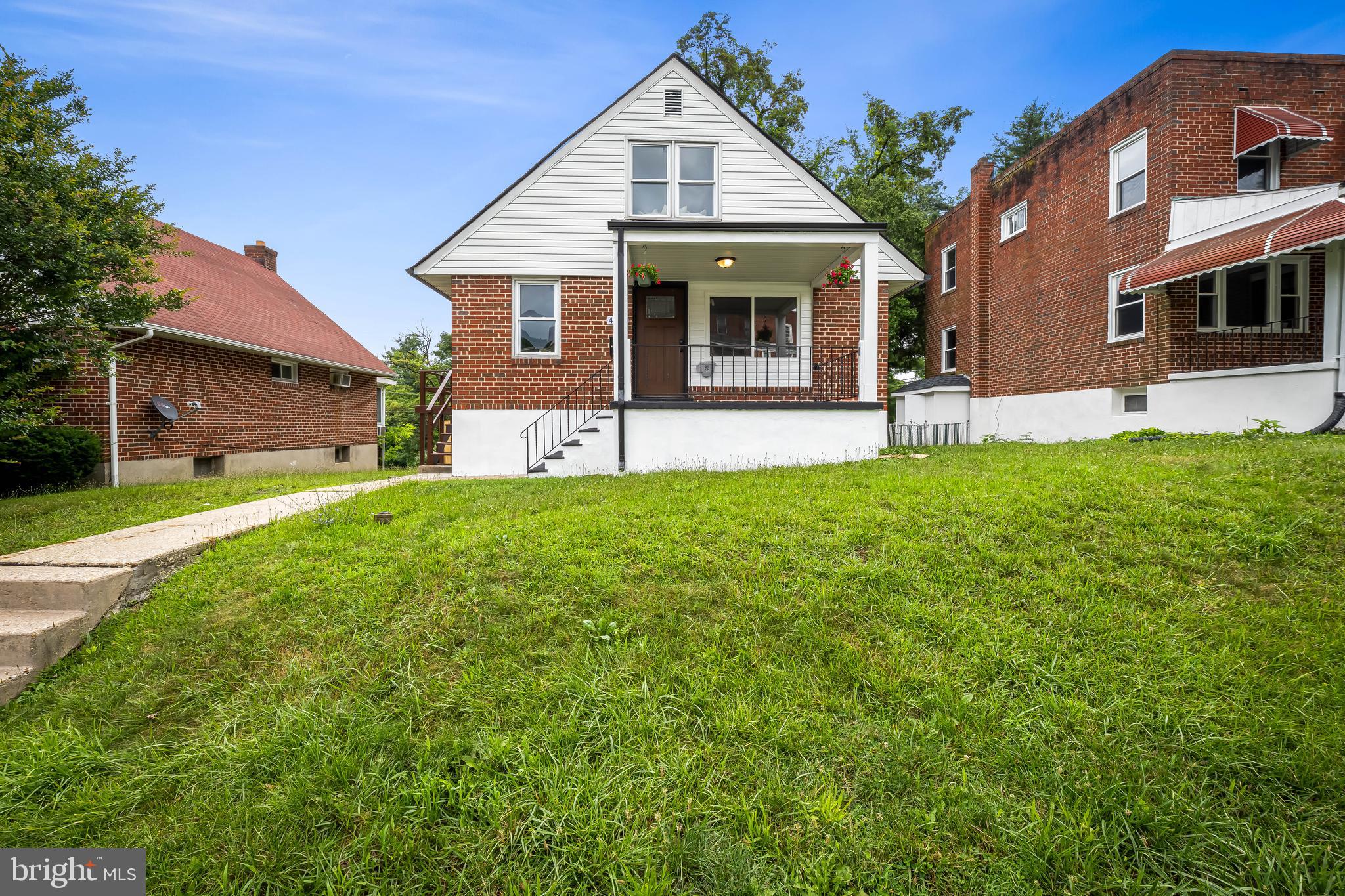 Welcome to this beautifully renovated 4-bedroom, 3-bathroom porch front home, perfectly situated near Sinai Hospital, Pimlico, and with quick access to I-83 for an easy commute. Step inside to find a bright, open layout featuring stylish modern finishes and thoughtful updates throughout. The spacious main level includes a stunning gourmet kitchen with QUARTZ countertops, stainless steel appliances, and brand new cabinetry. Enjoy the comfort of two main-level bedrooms and a full bath—perfect for guests or flexible living space. Upstairs, you’ll find a private primary suite with a spa-like bathroom and generous closet space, as well as another spacious bedroom. The finished lower level offers a large family room/flex space ideal for entertaining or relaxing, and another full bathroom. The basement offers Its own WALK OUT EXIT. Outside, enjoy a spacious yard and off street parking! Every detail has been carefully updated—just move in and enjoy!