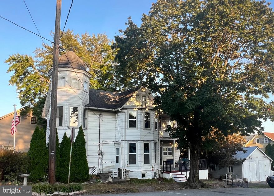 Charming Queen Anne Victorian with Modern Amenities on a Corner Lot
Step into timeless elegance blended seamlessly with modern comfort in this beautiful Queen Anne Victorian-style home. Nestled on a desirable corner lot, this exquisite property offers original American Chestnut hardwood floors, a rare and stunning feature that exudes historic character.
The chef’s kitchen is a must see, featuring a granite-topped island, butcher block countertops, stylish backsplash, and stainless-steel appliances—perfect for entertaining or family gatherings.
Enjoy luxury and relaxation with your private saltwater pool and cabana, creating the ultimate backyard oasis. The garage offers convenient storage or parking, while mini-split air conditioning ensures year-round comfort.
This smart home is loaded with upgrades, including many new windows, fresh paint inside and out, and smart home features throughout. For peace of mind, the home also includes a high-end security system with 9 cameras.